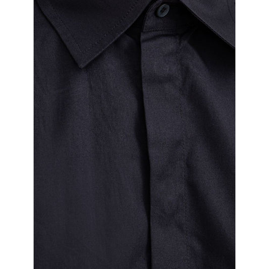 A navy blue cotton dress shirt with a collar, two buttons and long sleeves