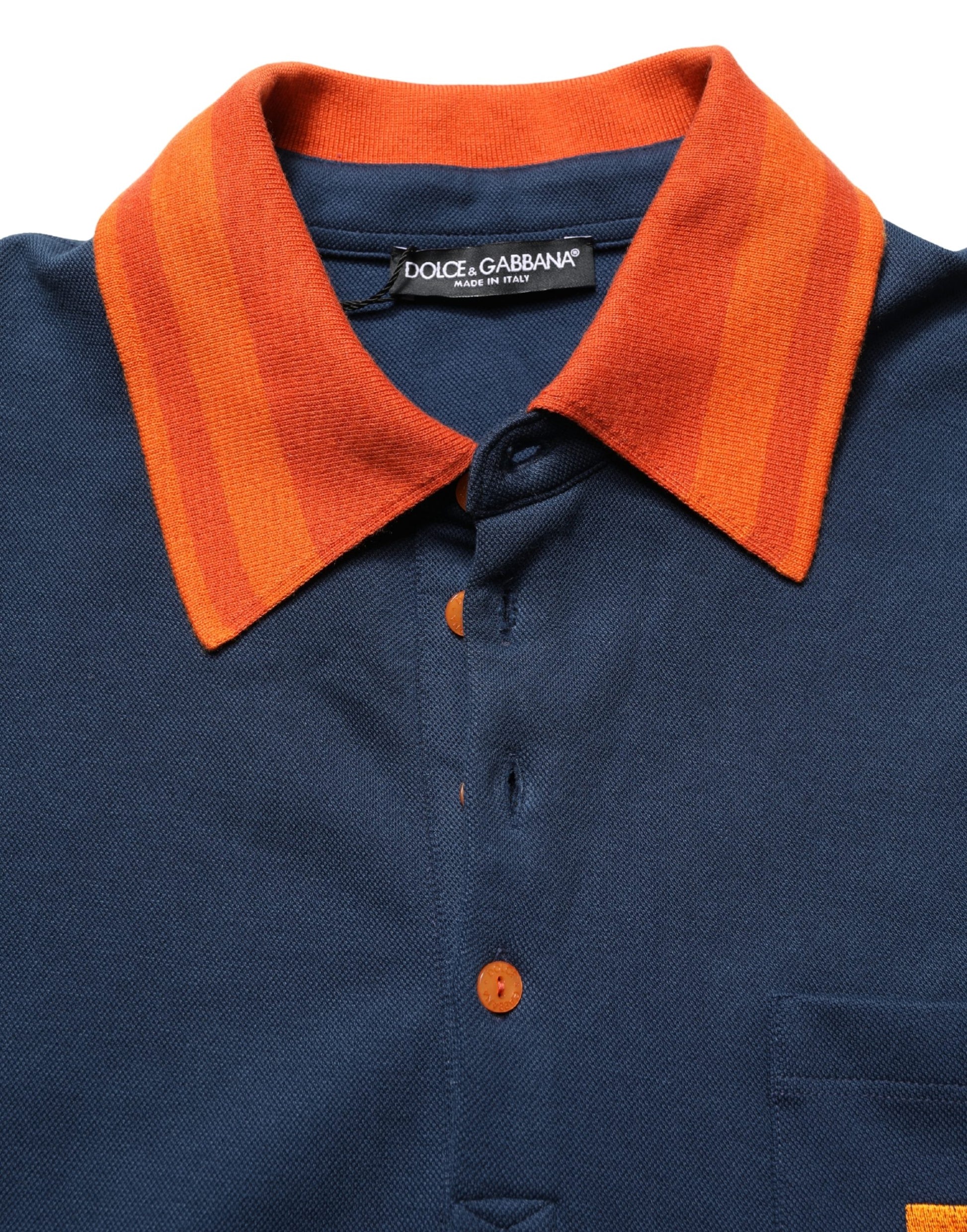 Blue shirt with orange collar and buttons