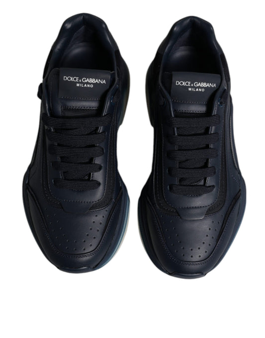 Pair of black sneakers with white logo on side