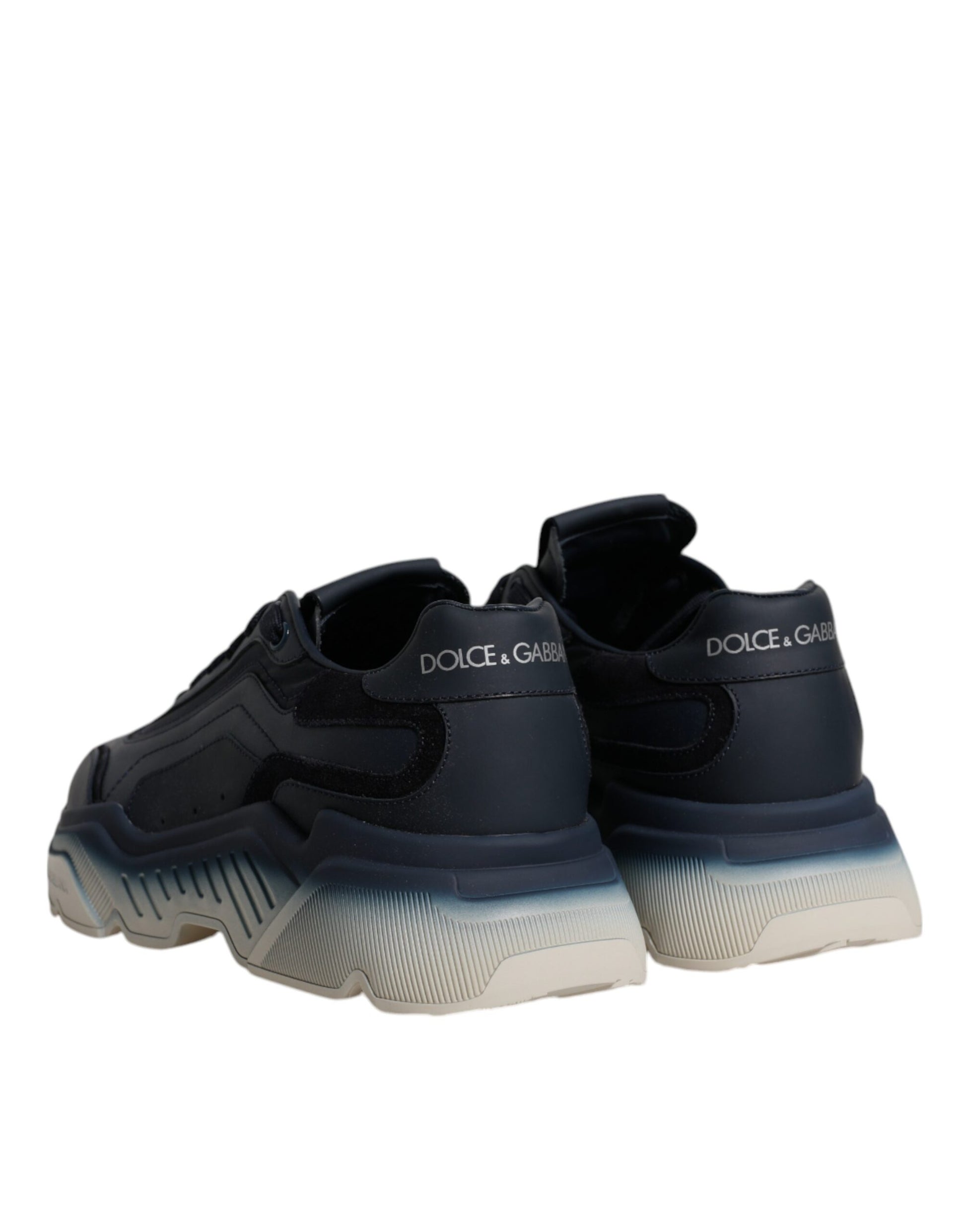 Navy blue men's sneakers with white soles, featuring the Dolce & Gabbana logo