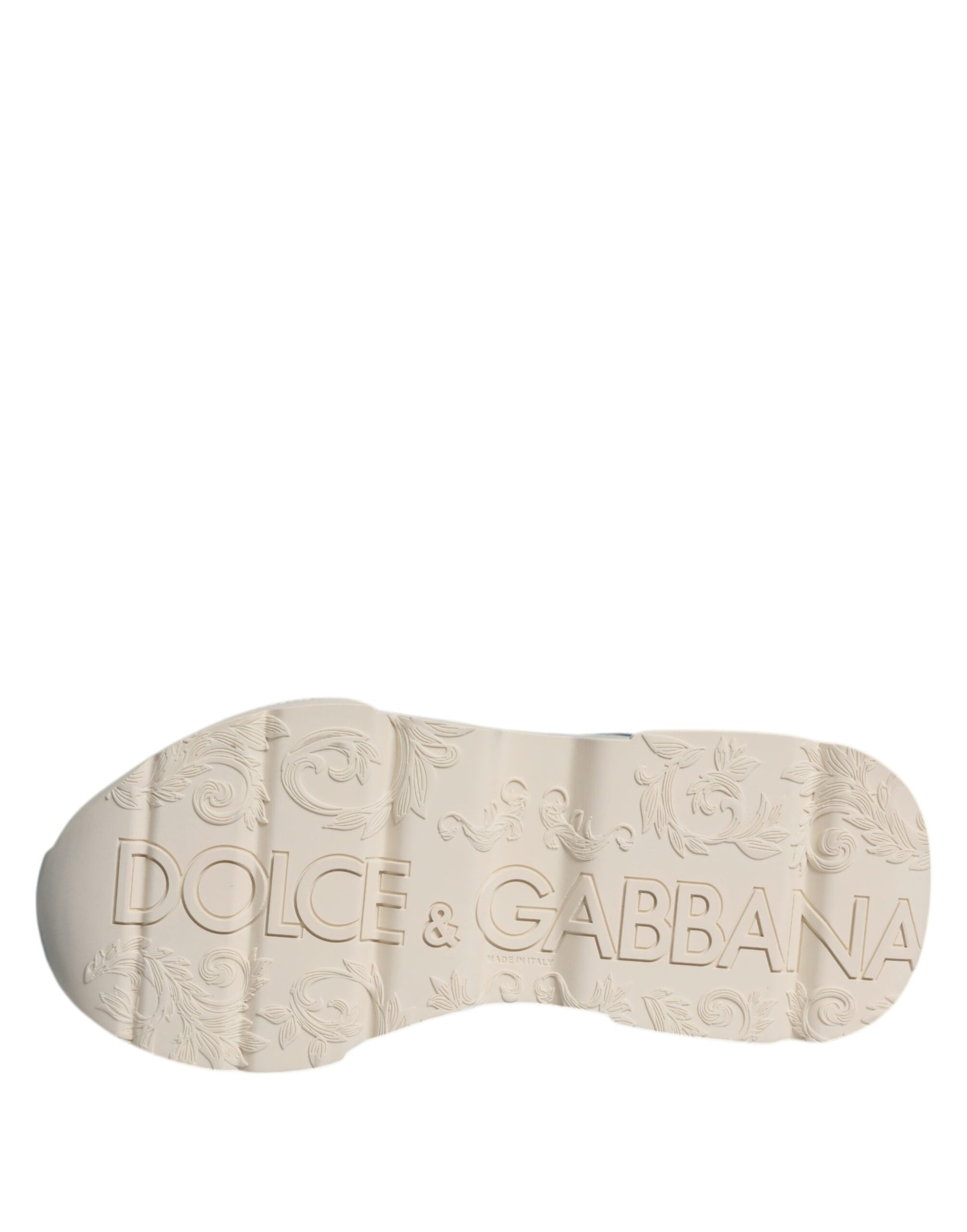 A single navy blue shoe with a white logo on the side, reading "Dolce & Gabbana"