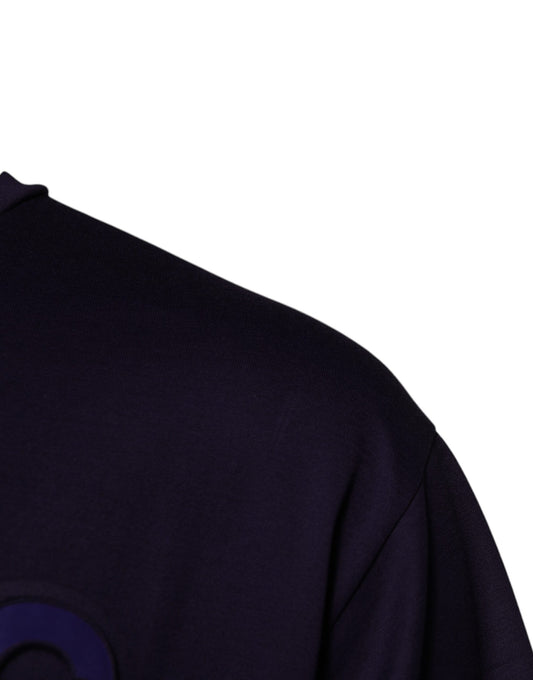 Black long sleeve shirt with a round logo on left chest area