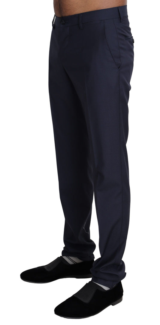 A pair of navy blue dress pants from the brand Dolce & Gabbana. They are designed for formal men's wear and f