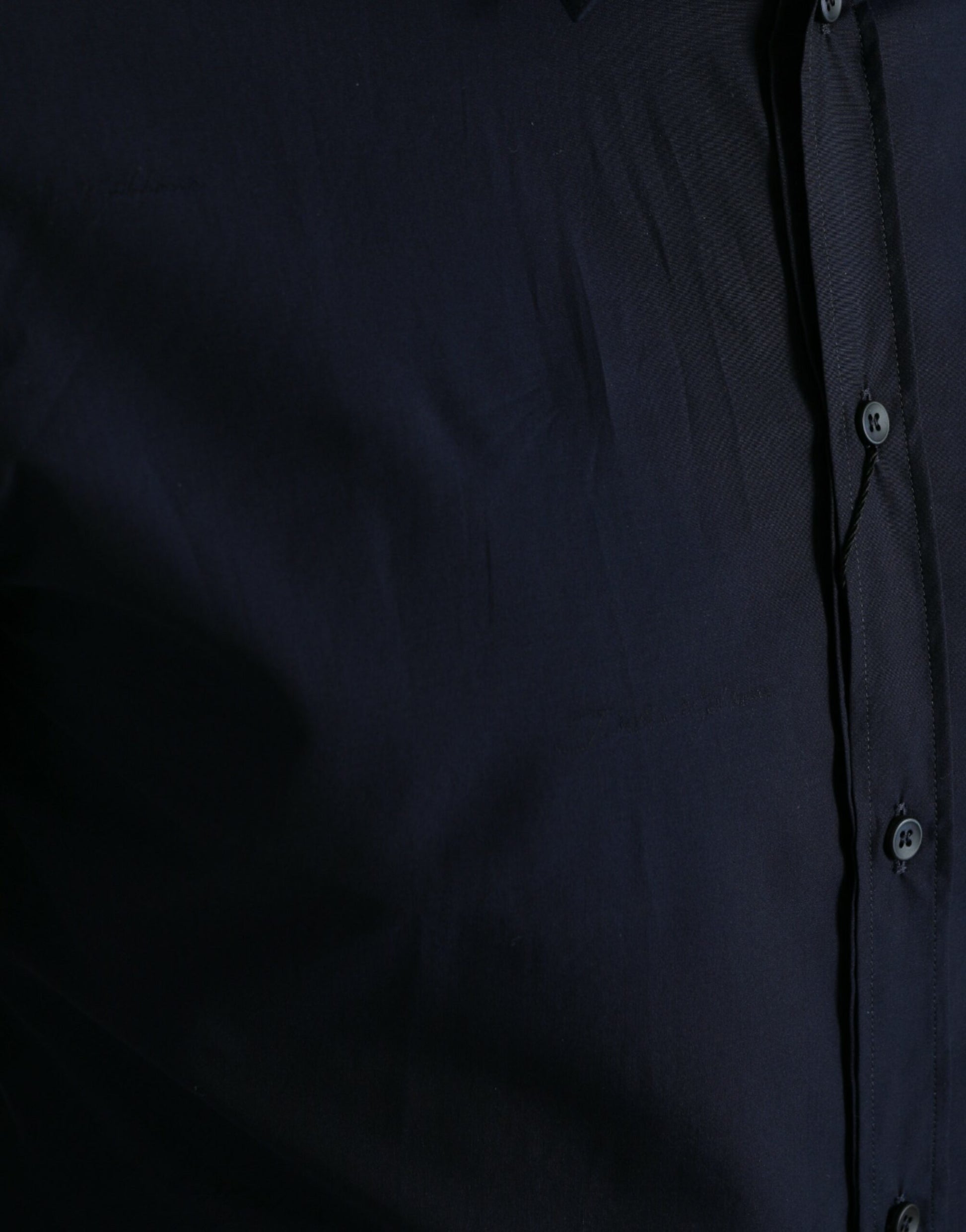 Dark blue dress shirt with gold buttons and slim fit
