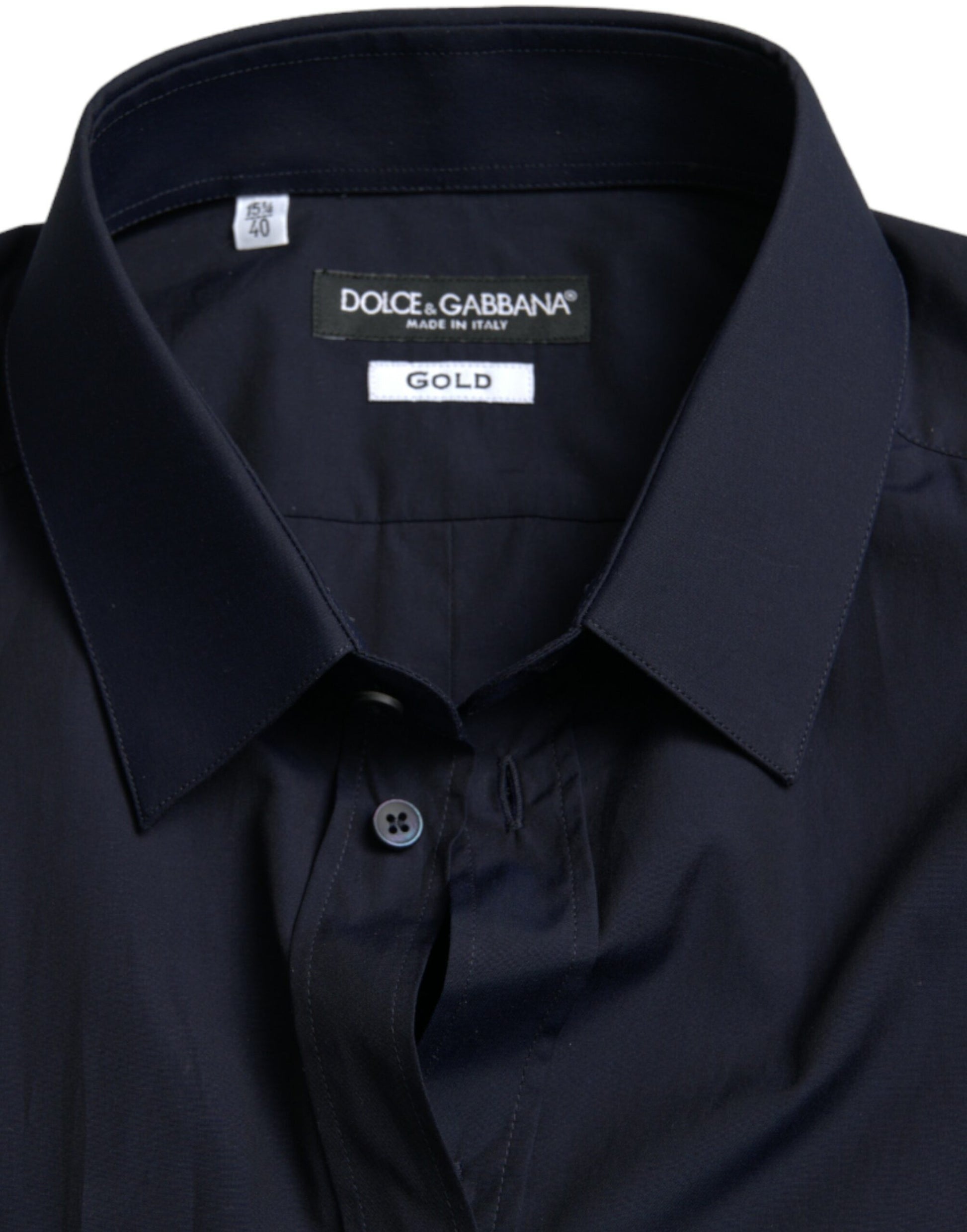 A navy blue slim fit formal shirt with a gold label on the collar