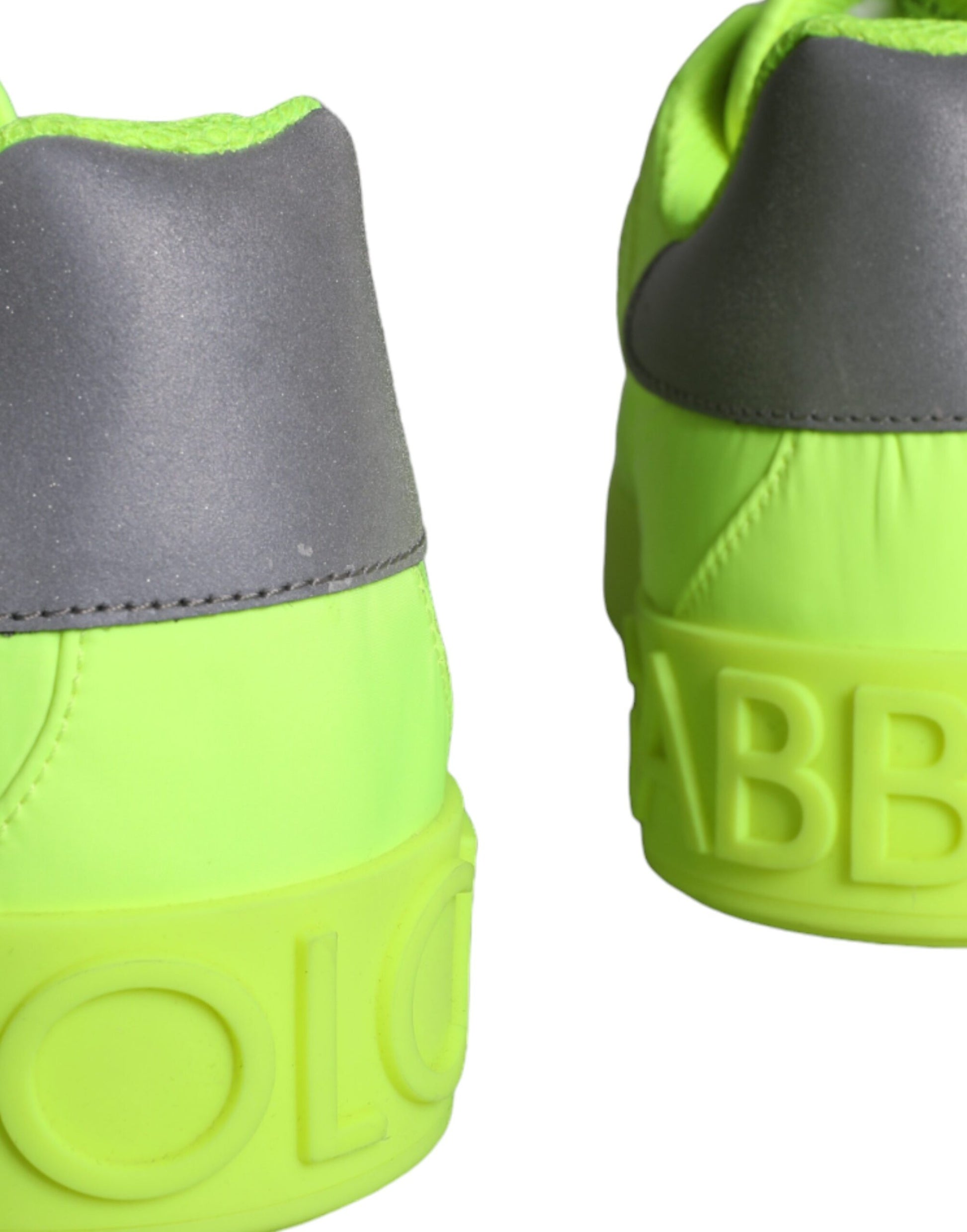 Yellow and gray sneaker with white sole
