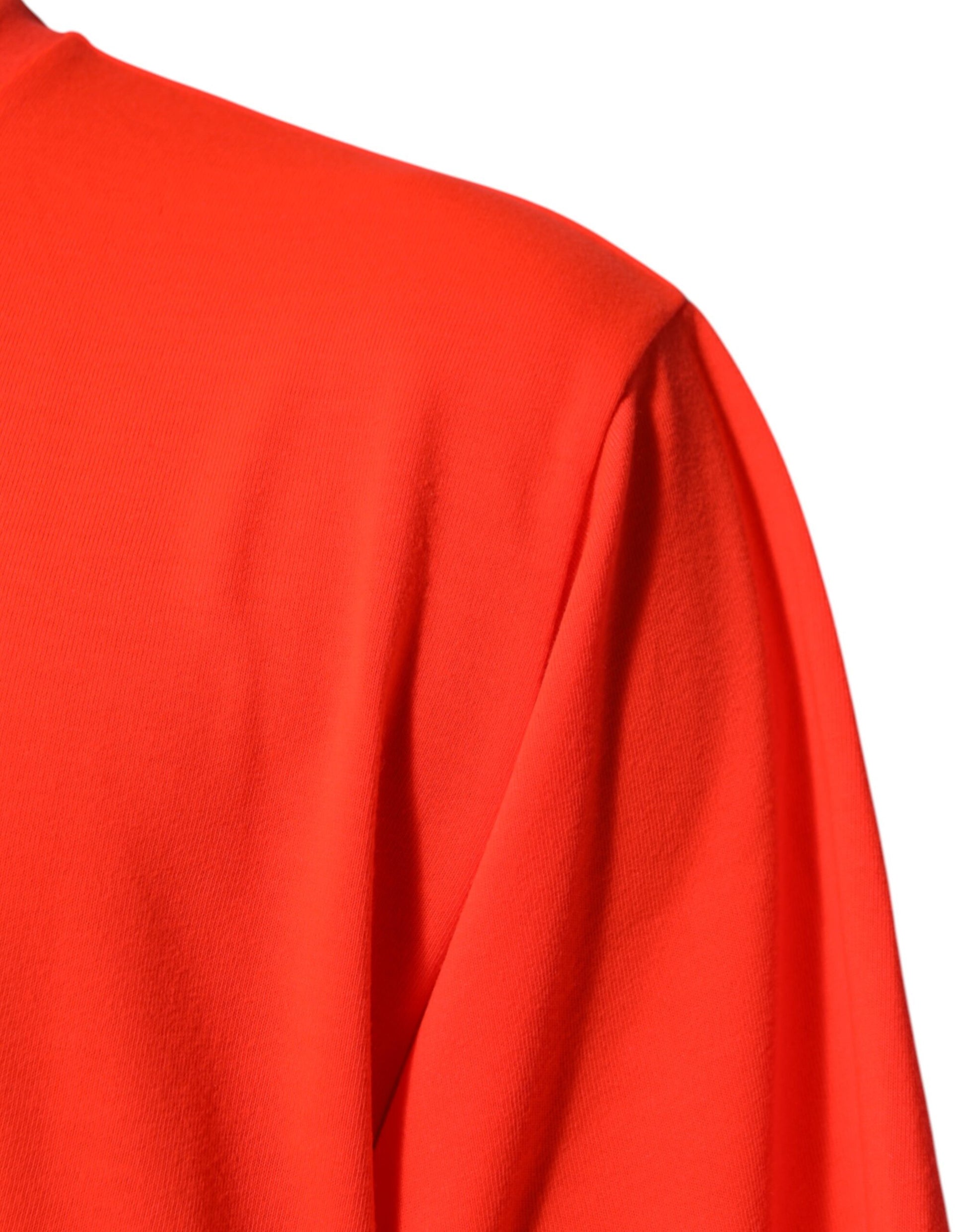Red long sleeve shirt on a mannequin