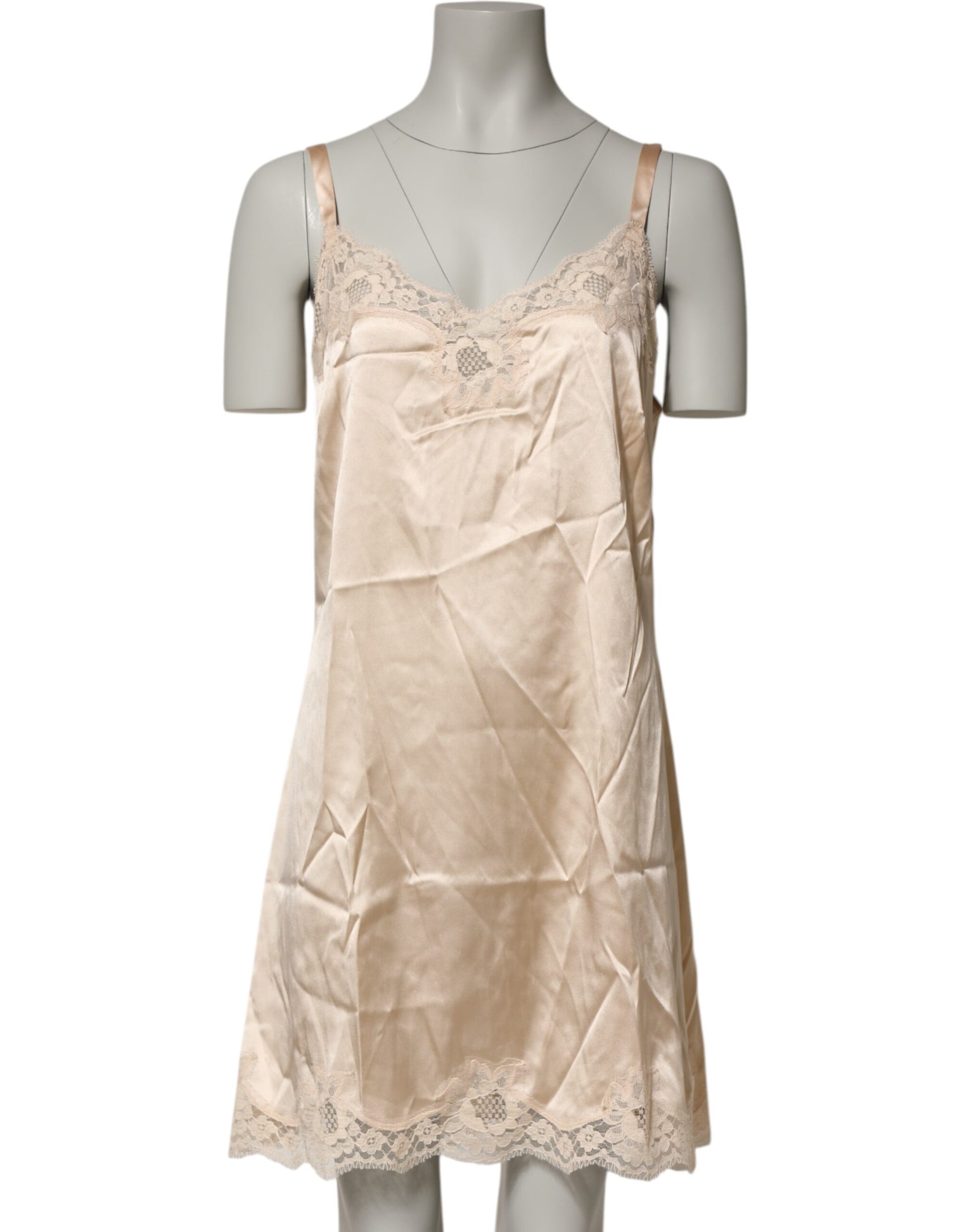A beige silk blend chemise with lace trim