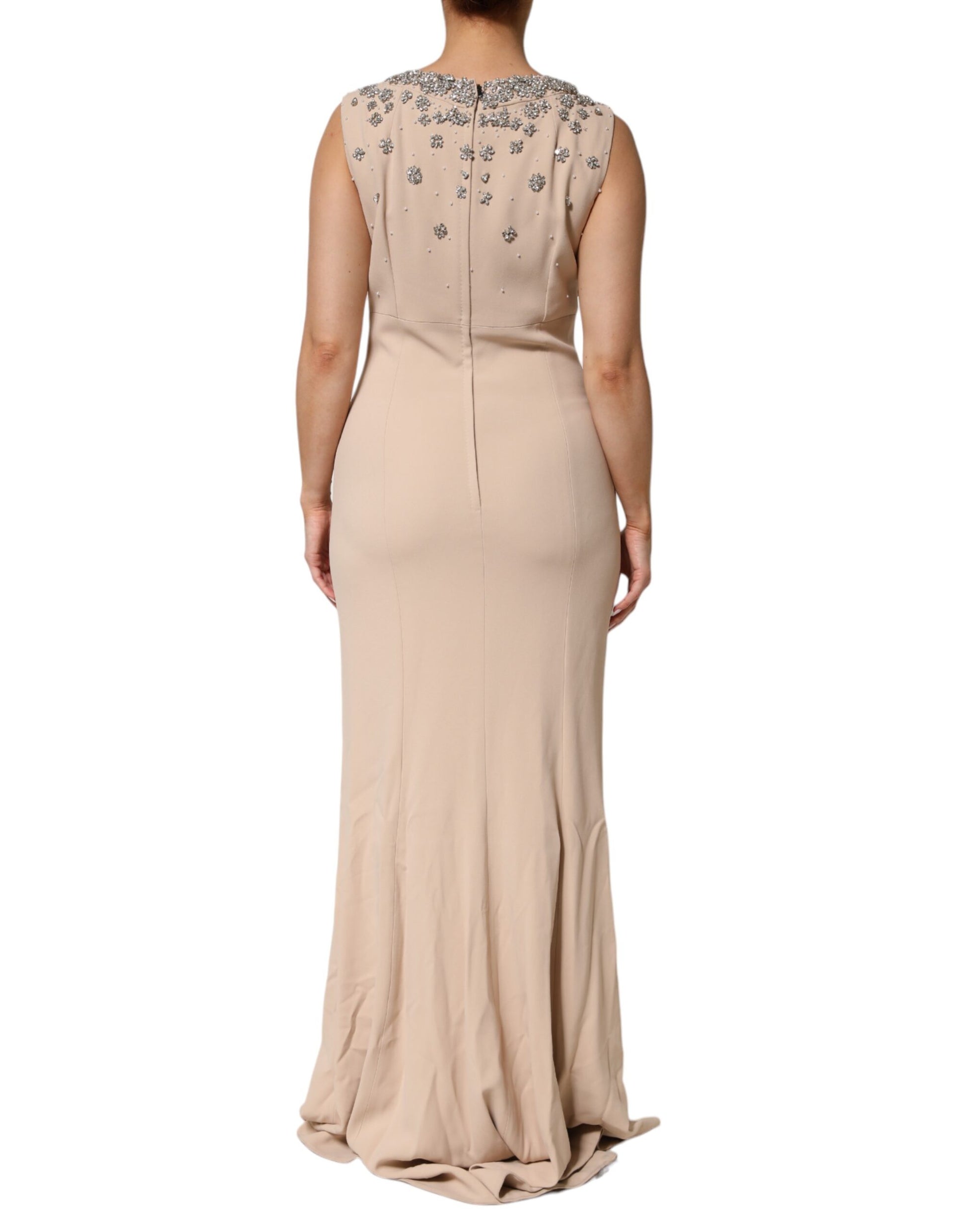 A beaded crystal embellished dress in nude ecru color