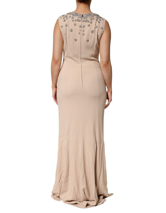 A beaded crystal embellished dress in nude ecru color