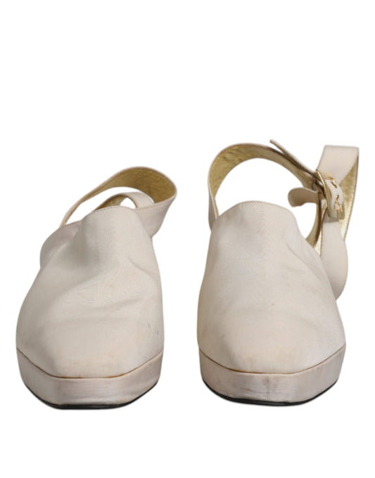 Tan women's flat shoes with gold accents