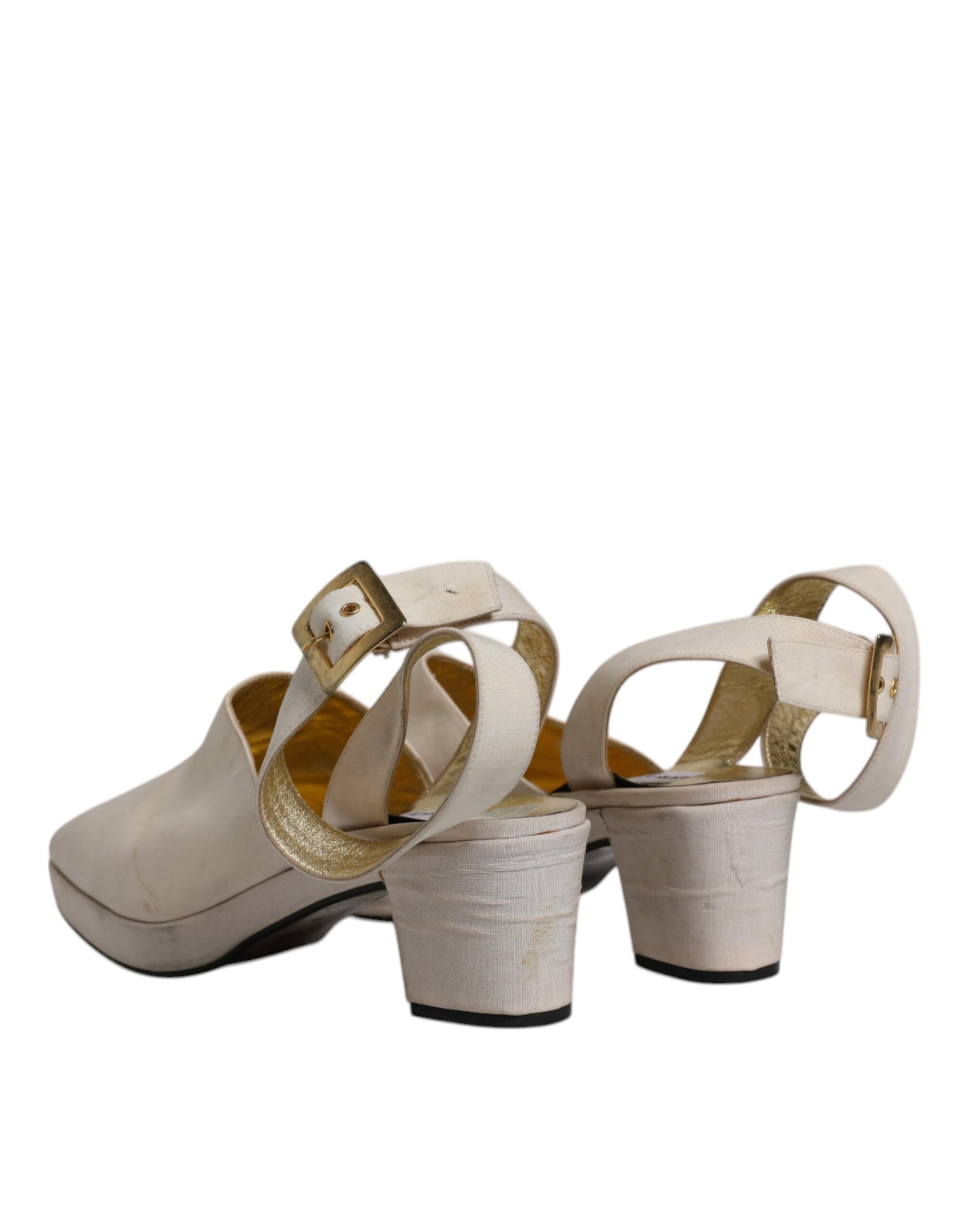 Pair of women's high heel sandals with gold accents