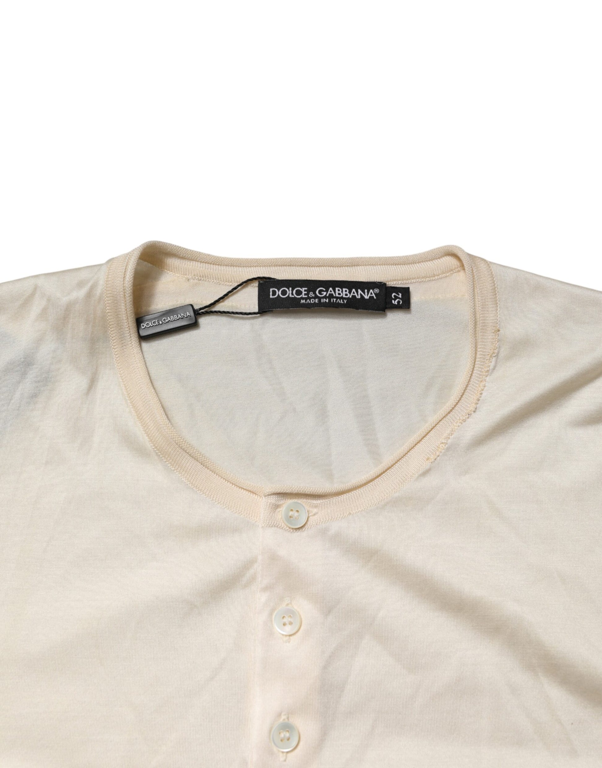 Tan crew neck sweater with buttons down front
