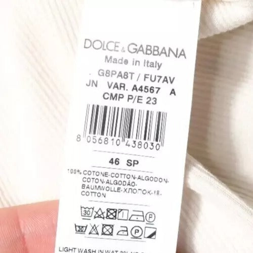 Tag on clothing item indicating brand and country of manufacture