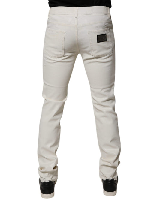 Pair of light wash jeans with back pocket detailing
