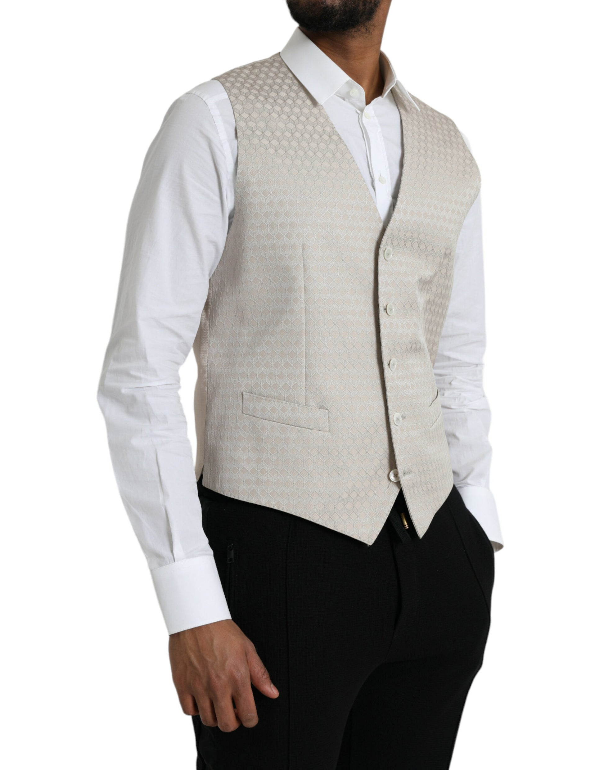 A mannequin wearing a beige waistcoat with a lapel and buttons