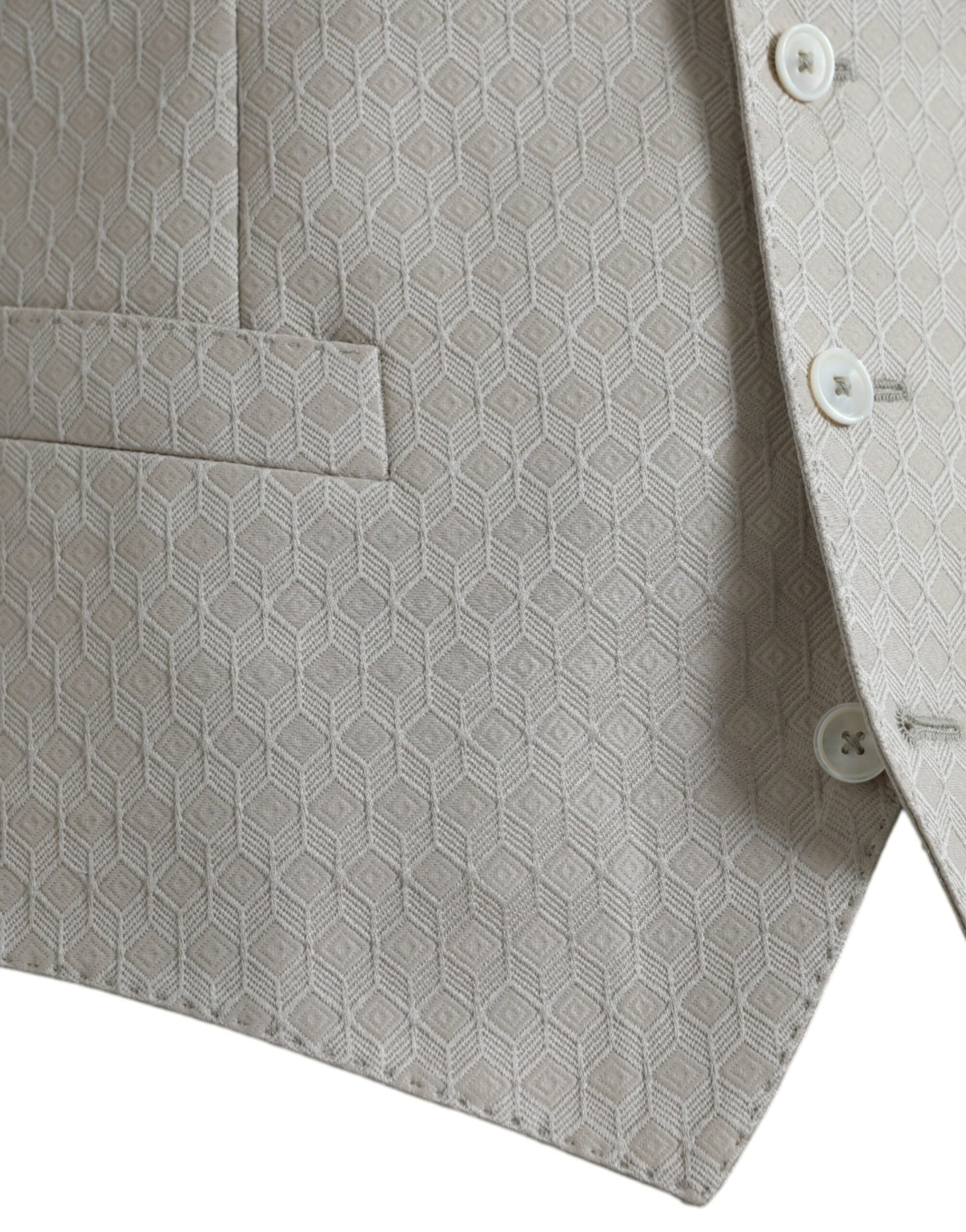 A gray waistcoat with a geometric pattern, part of a formal dress suit