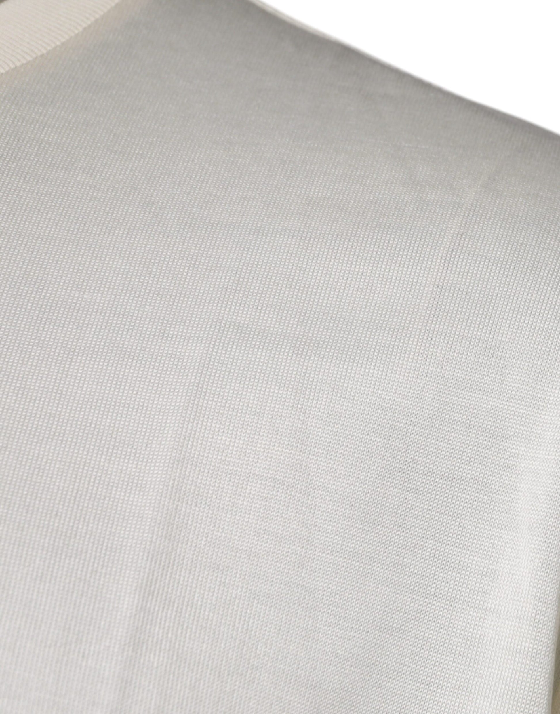 A close-up view of a fabric item, possibly a garment or accessory, with a textured surface that appears to be