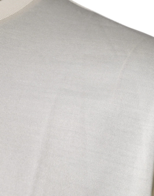 A close-up view of a fabric item, possibly a garment or accessory, with a textured surface that appears to be