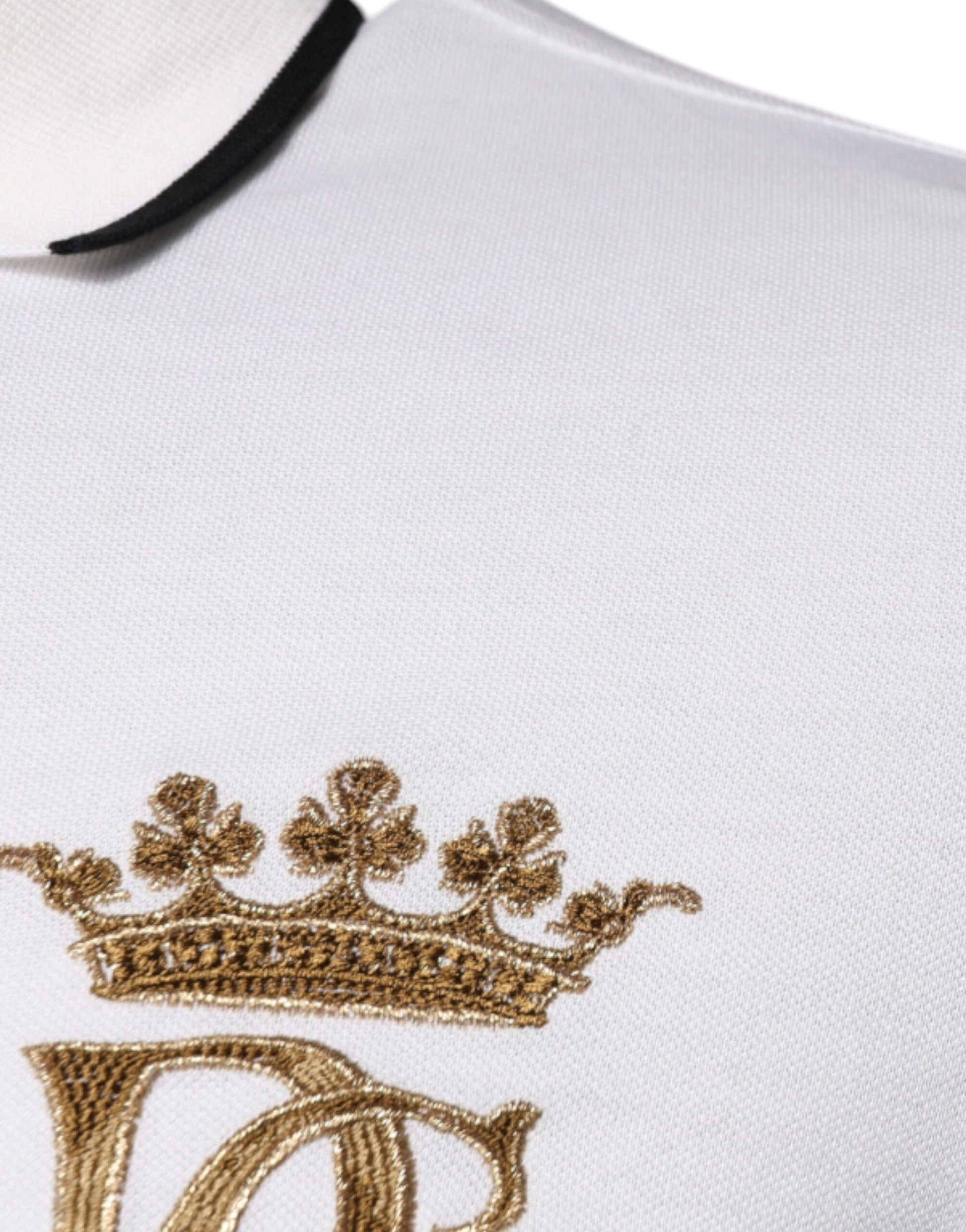White soccer jersey with gold crown emblem on front