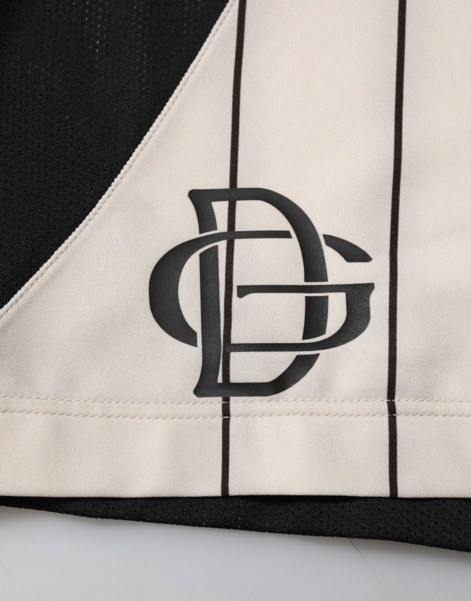 Black and white baseball jersey with logo on sleeve