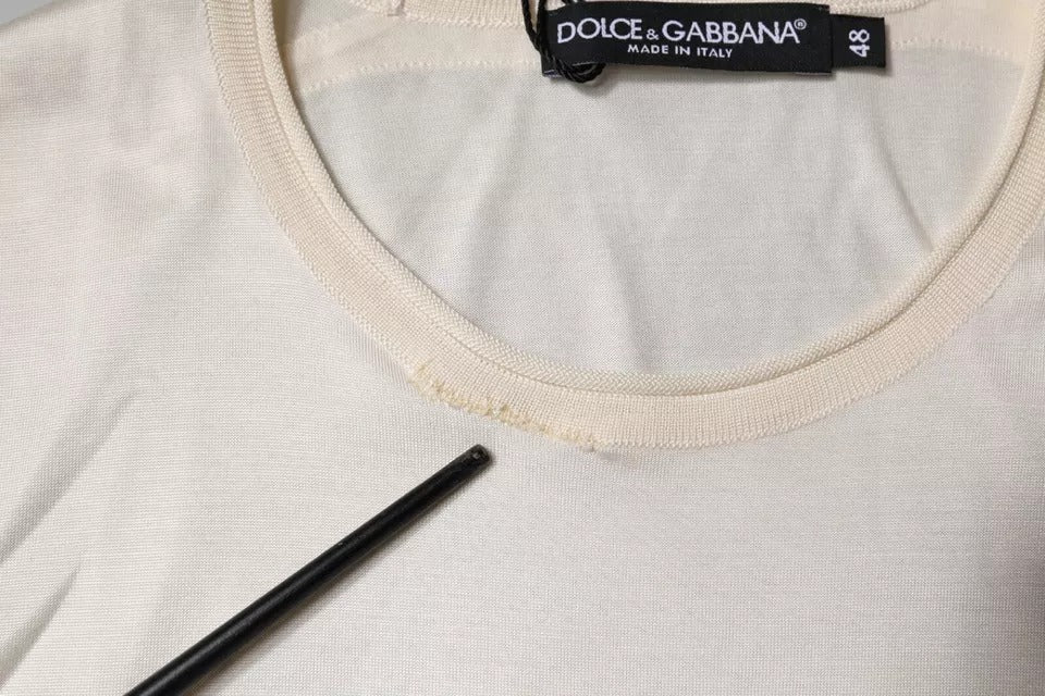 White t-shirt on hanger with black tag