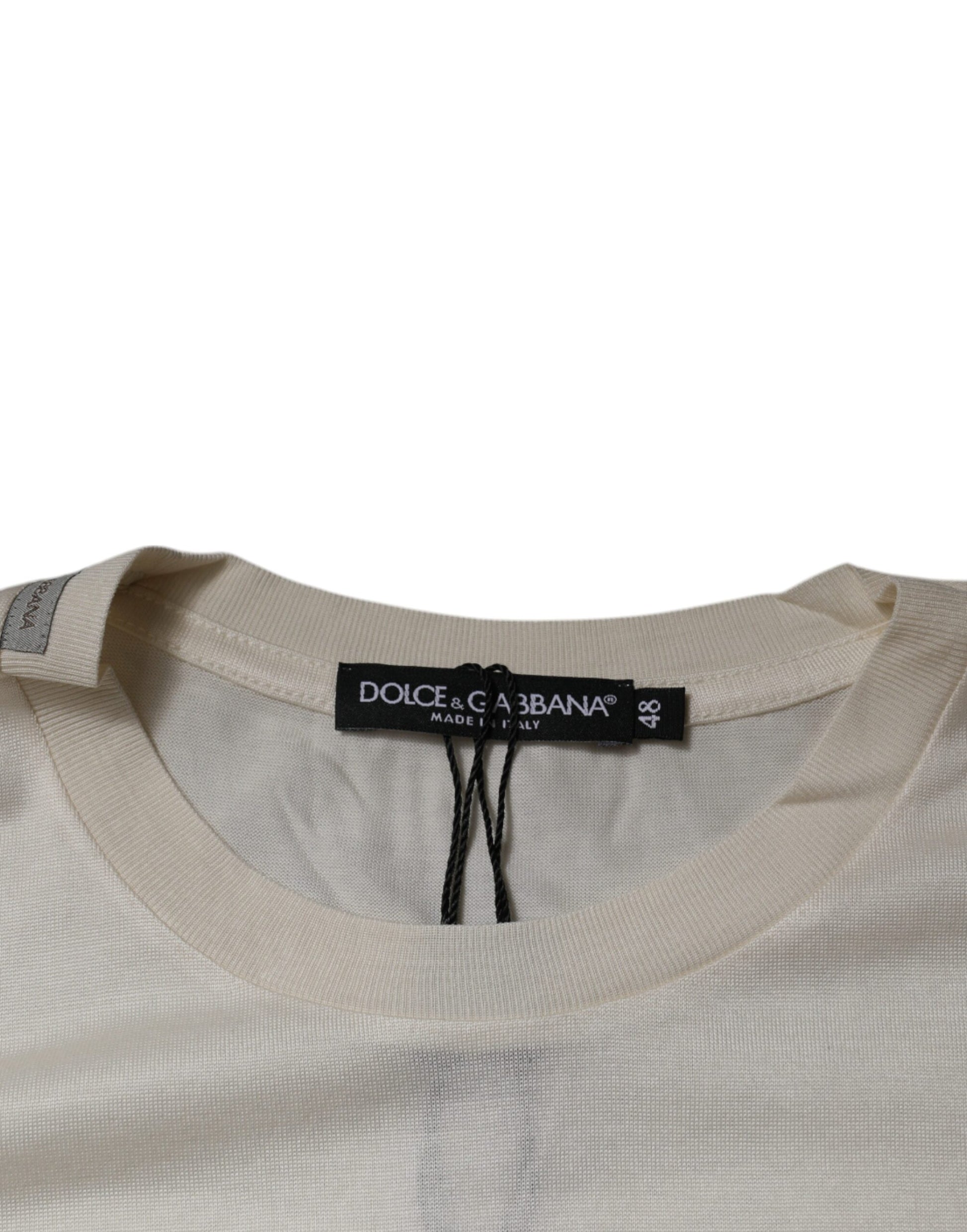 Tan sweater on hanger