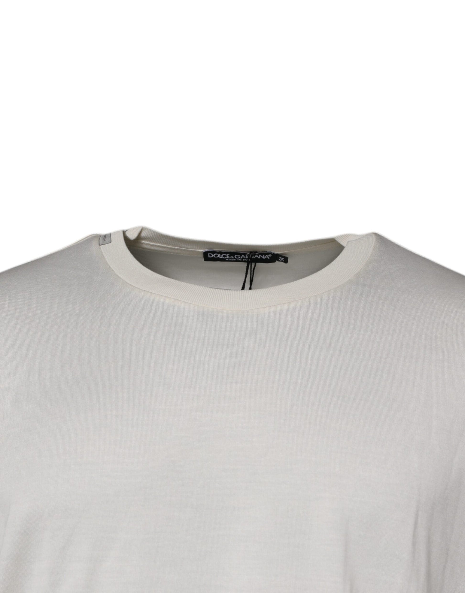 White long sleeve shirt on hanger