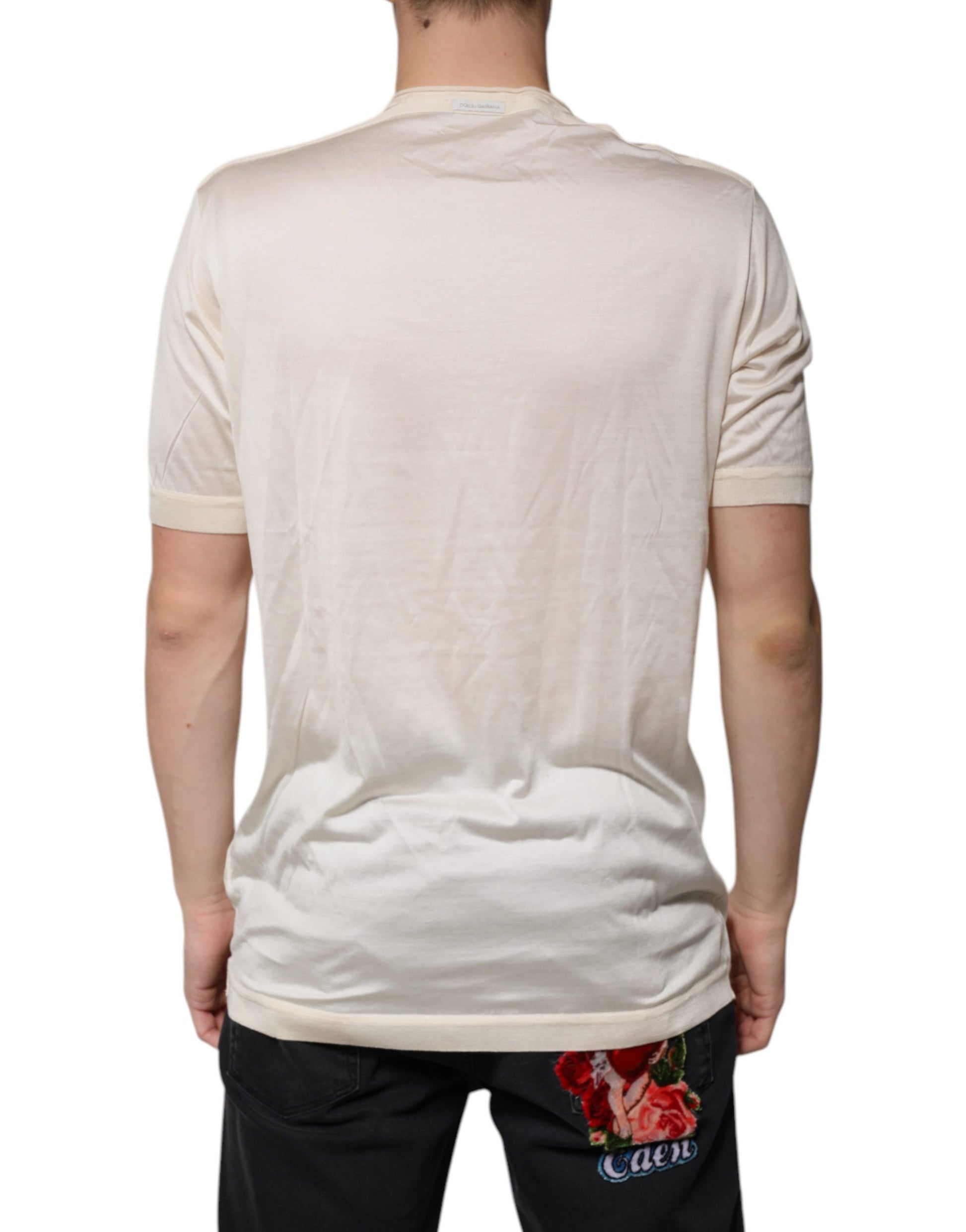 Back view of a short sleeve shirt with a floral design on the back