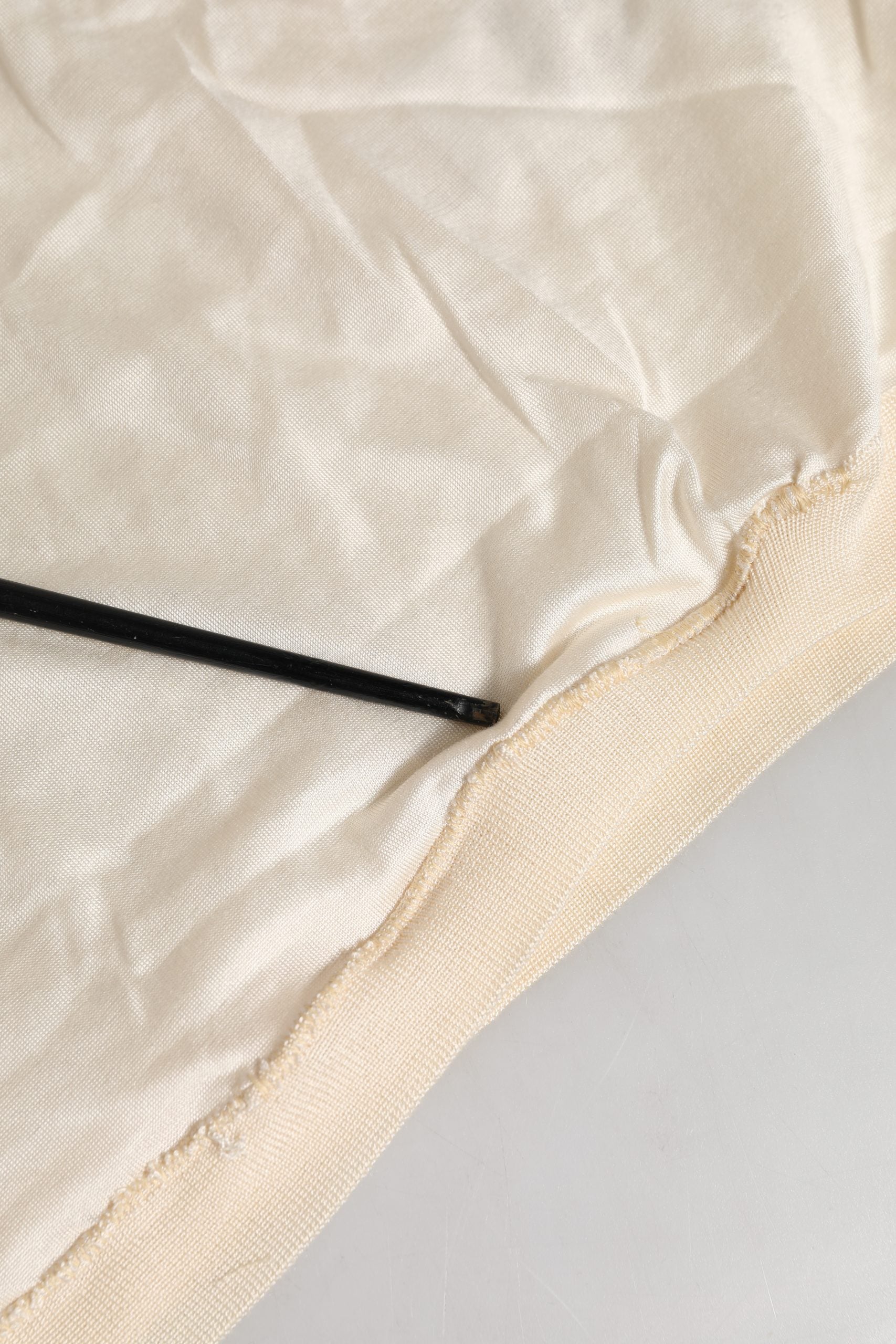 Black thread on fabric