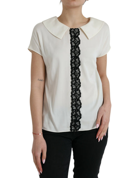 White blouse with black lace trim on sleeves