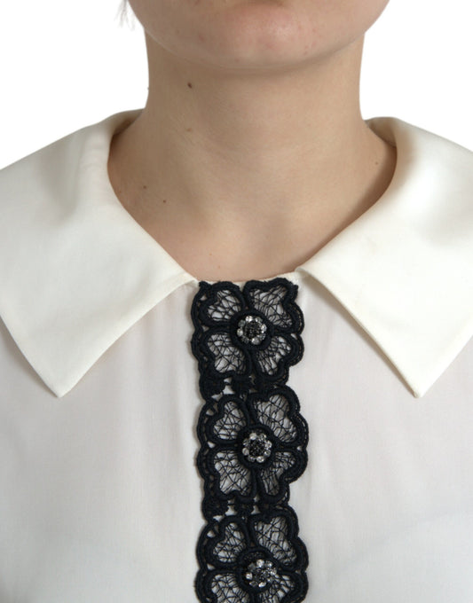 Black lace collar on white blouse