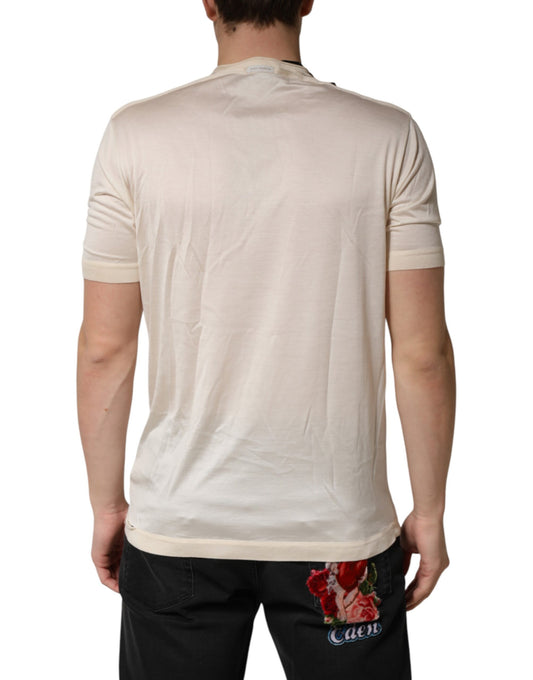 Man wearing a short sleeve shirt with floral pattern on back