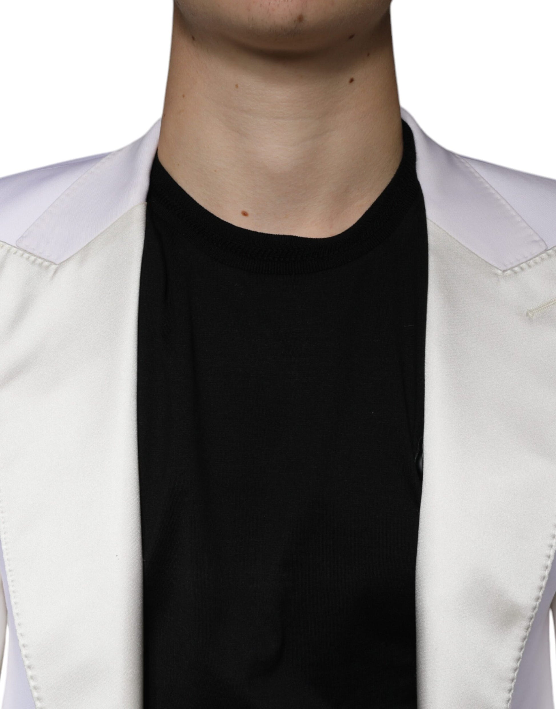 A black and white blazer with a single breasted design, featuring wool fabric