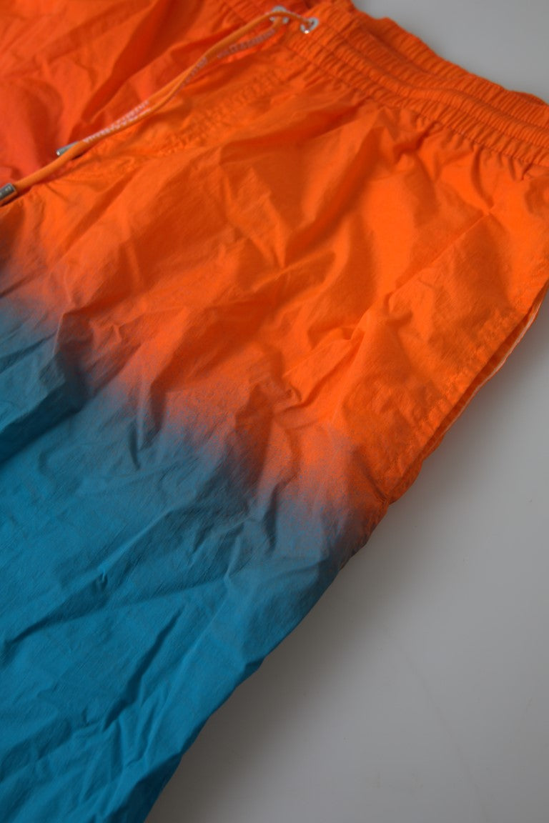 Orange swim trunks with blue trim