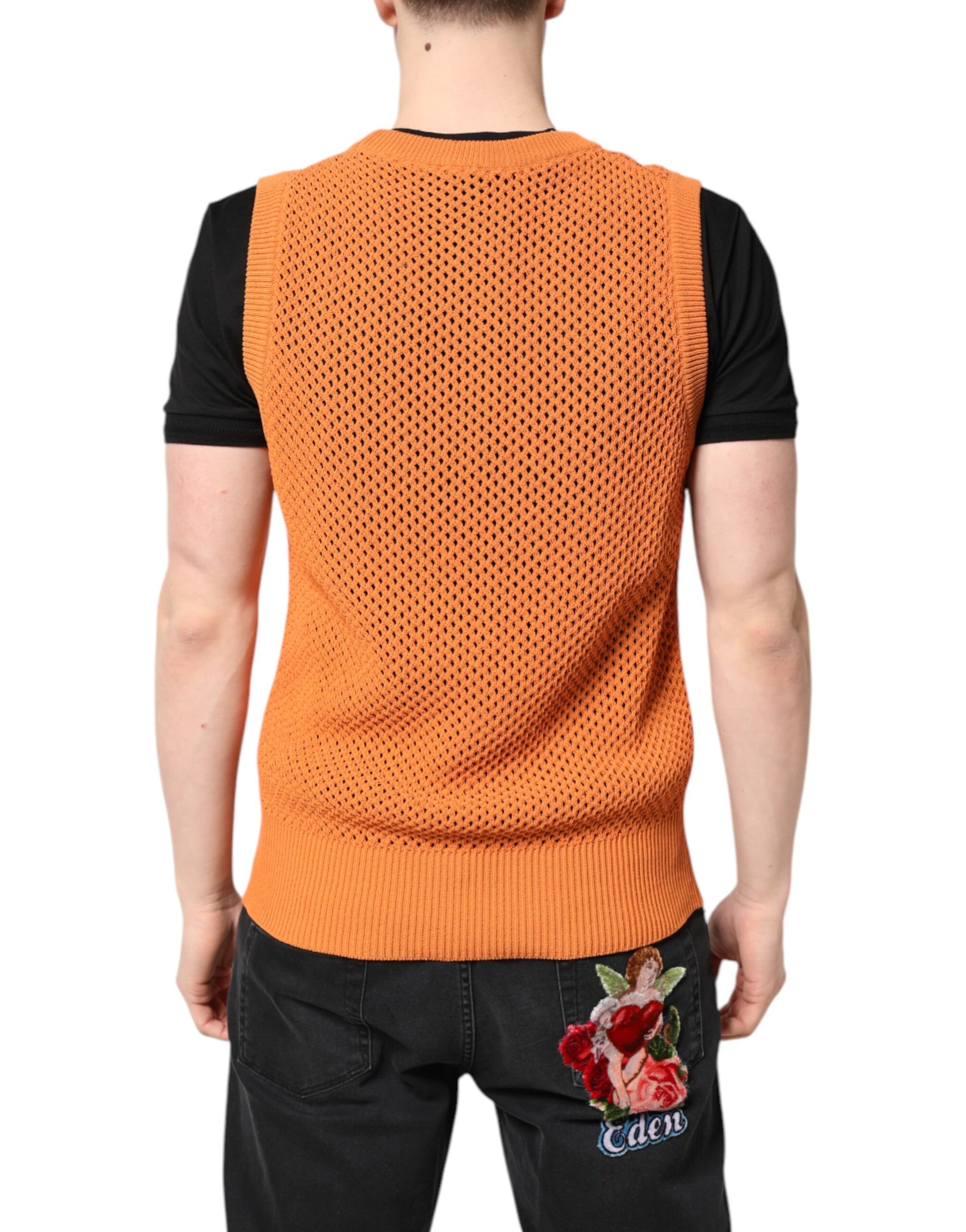 Orange knit vest on mannequin