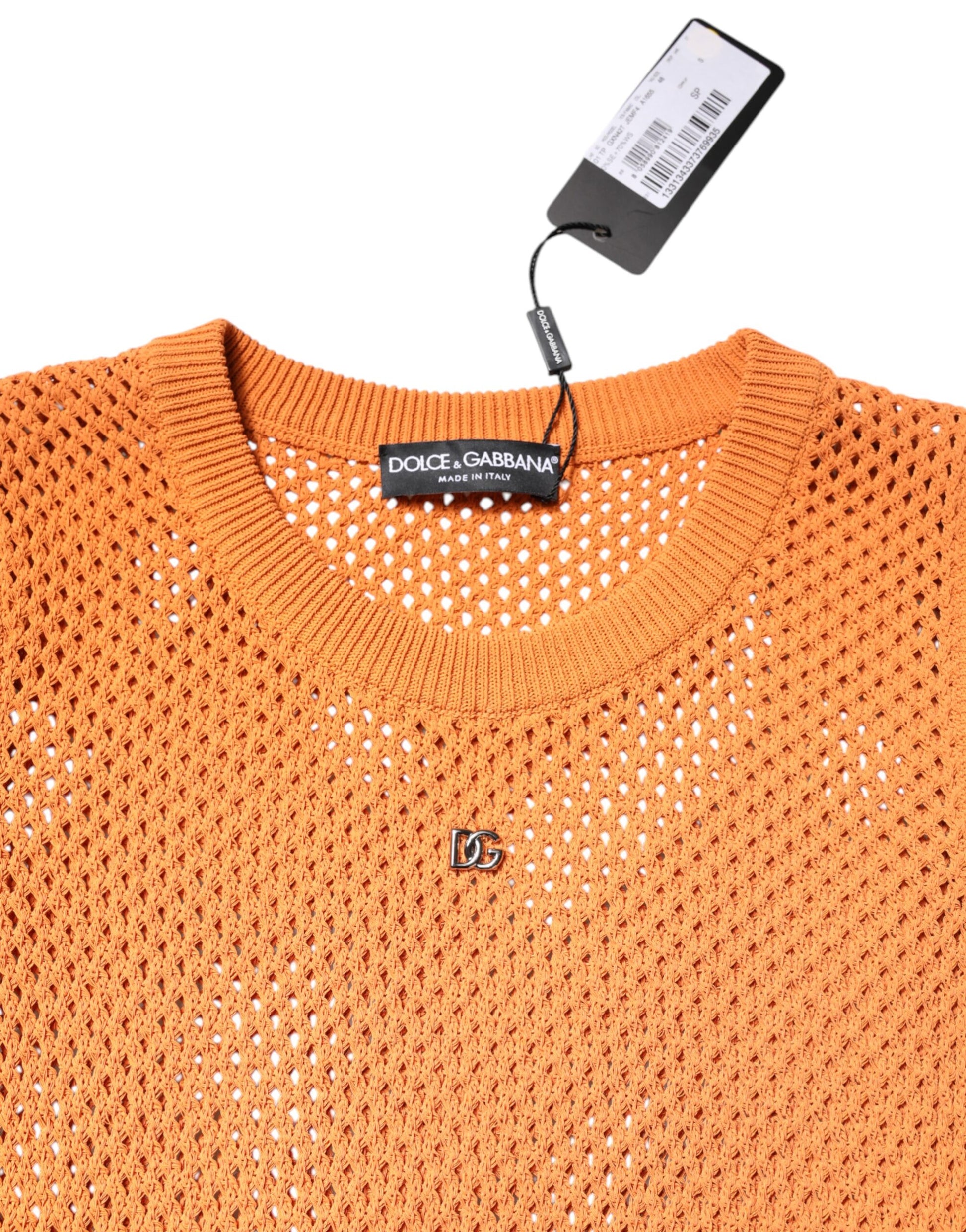 Orange knit sweater with holes
