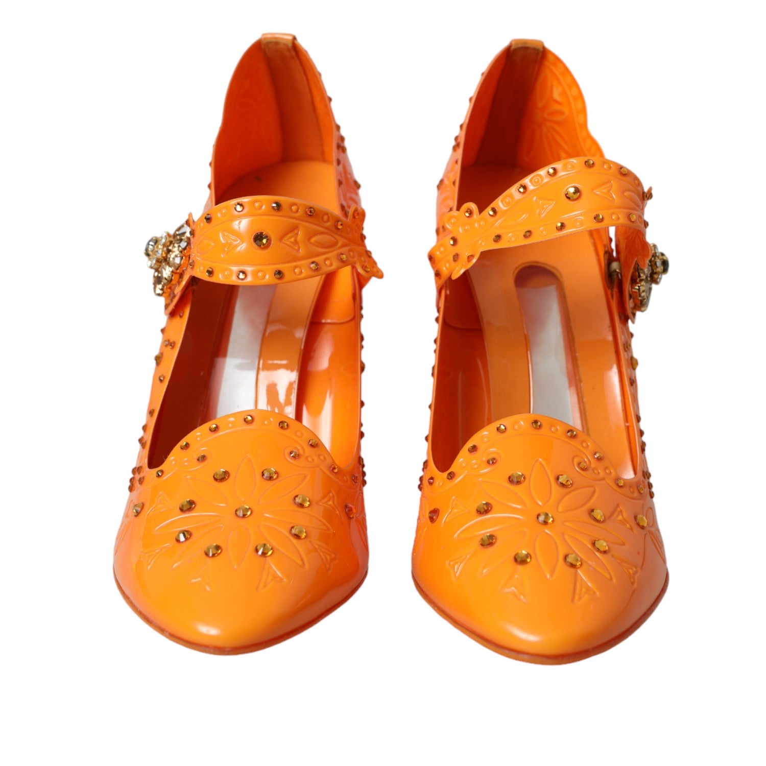 Pair of orange women's shoes with embroidery and studded detailing