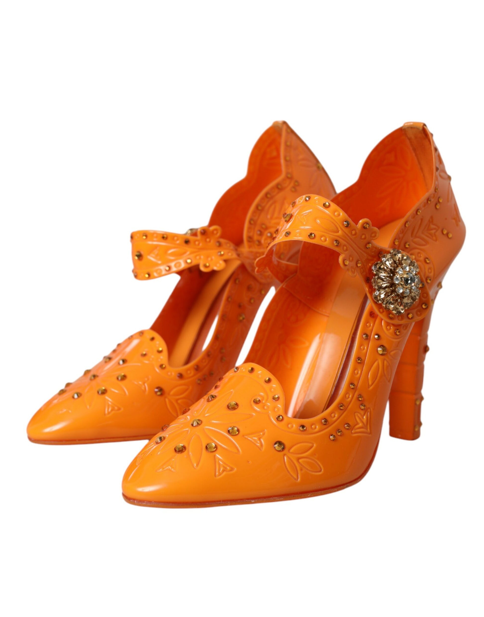 Pair of orange high heel shoes with embellishments and bow design