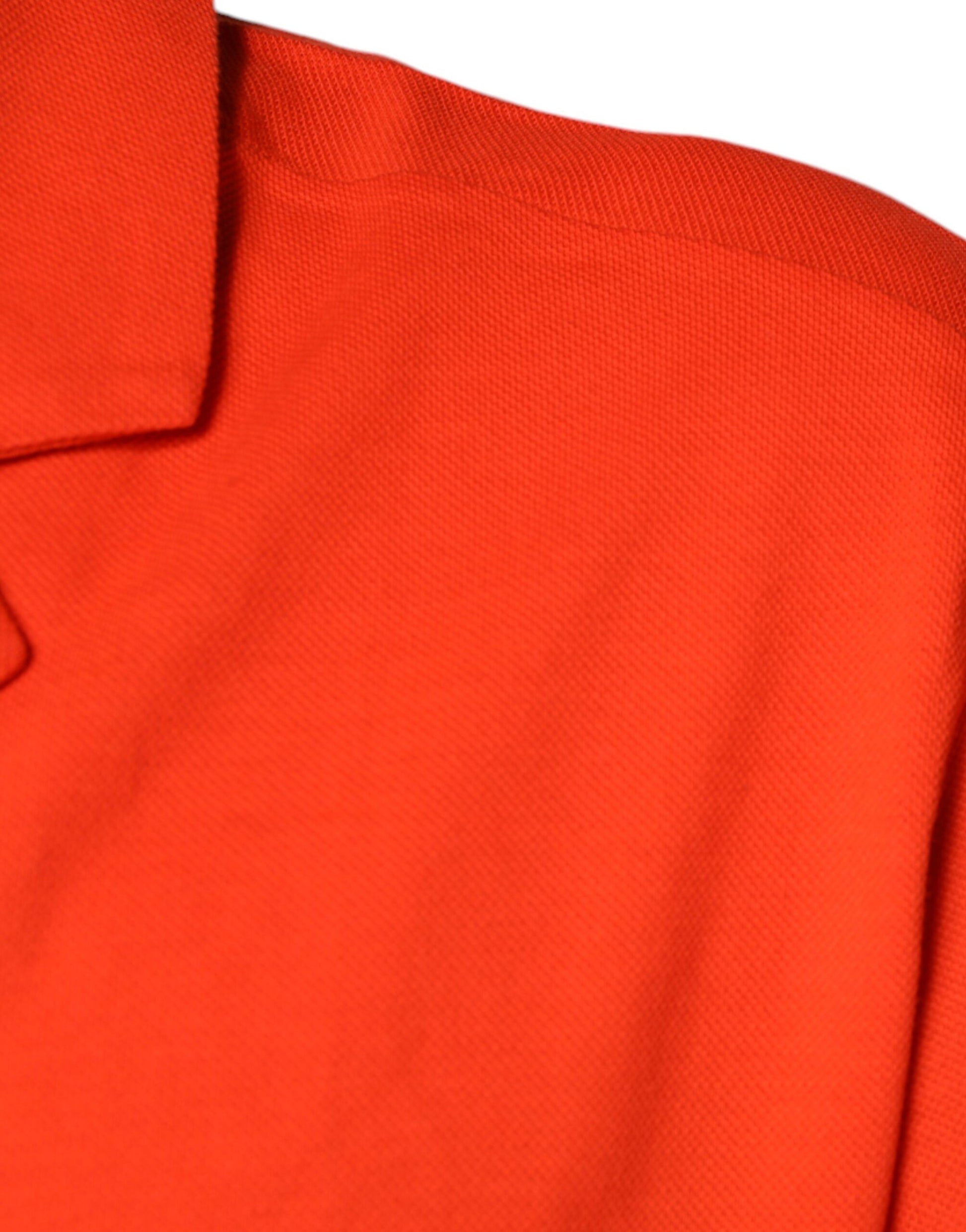 Red polo shirt on hanger