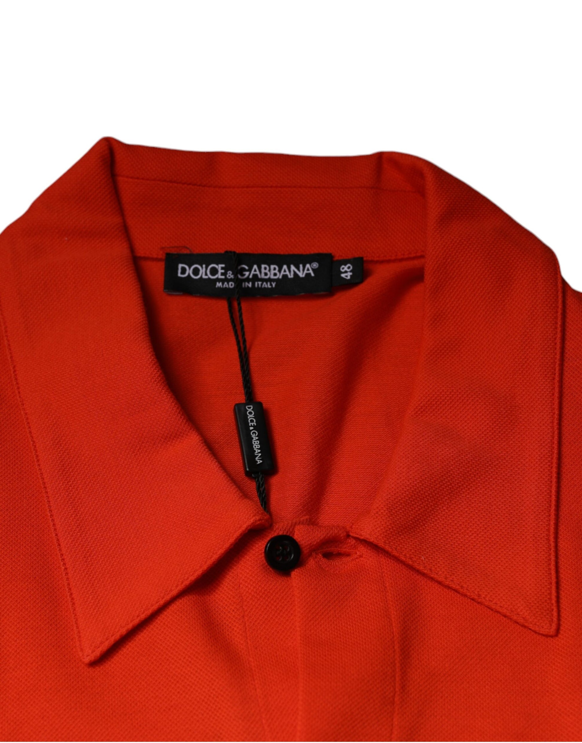 Red jacket on hanger with black tag