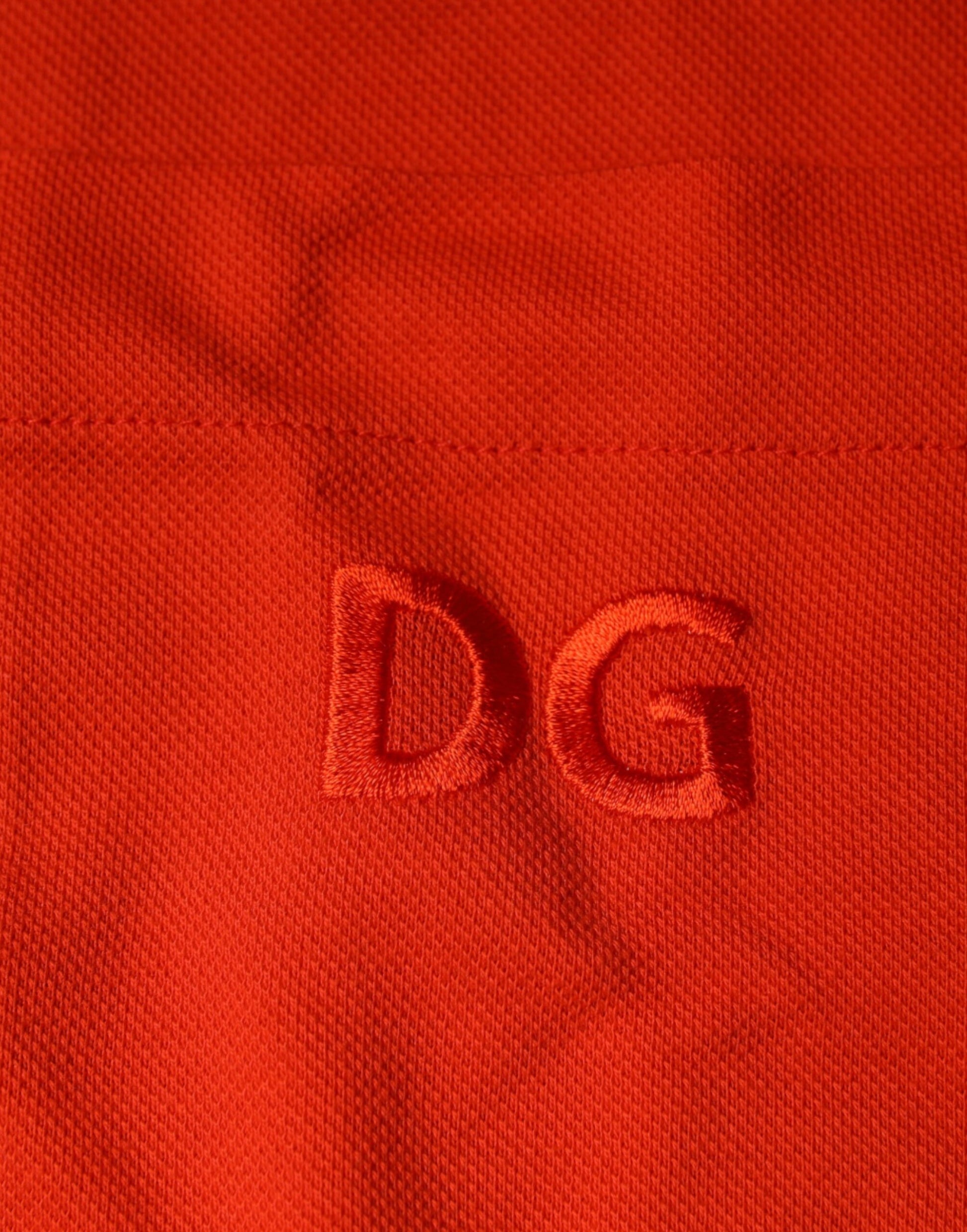 Red fabric with embroidered initials DG