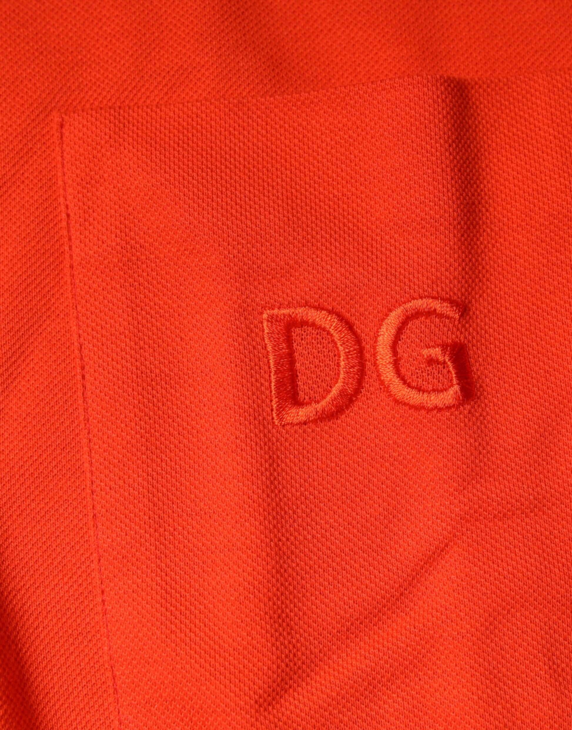 Red fabric with embroidered initials DG