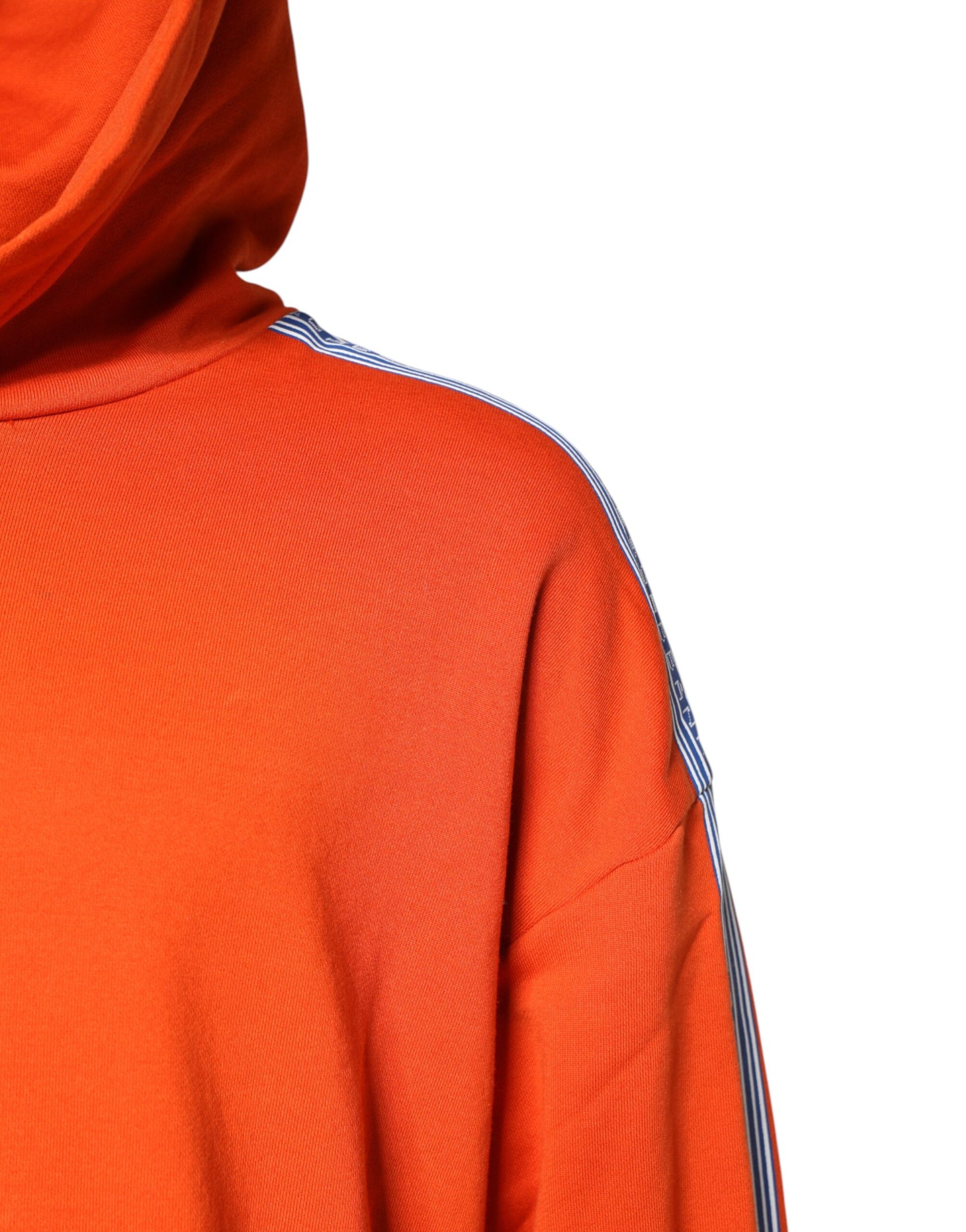 Orange hoodie with white stripes on sleeves