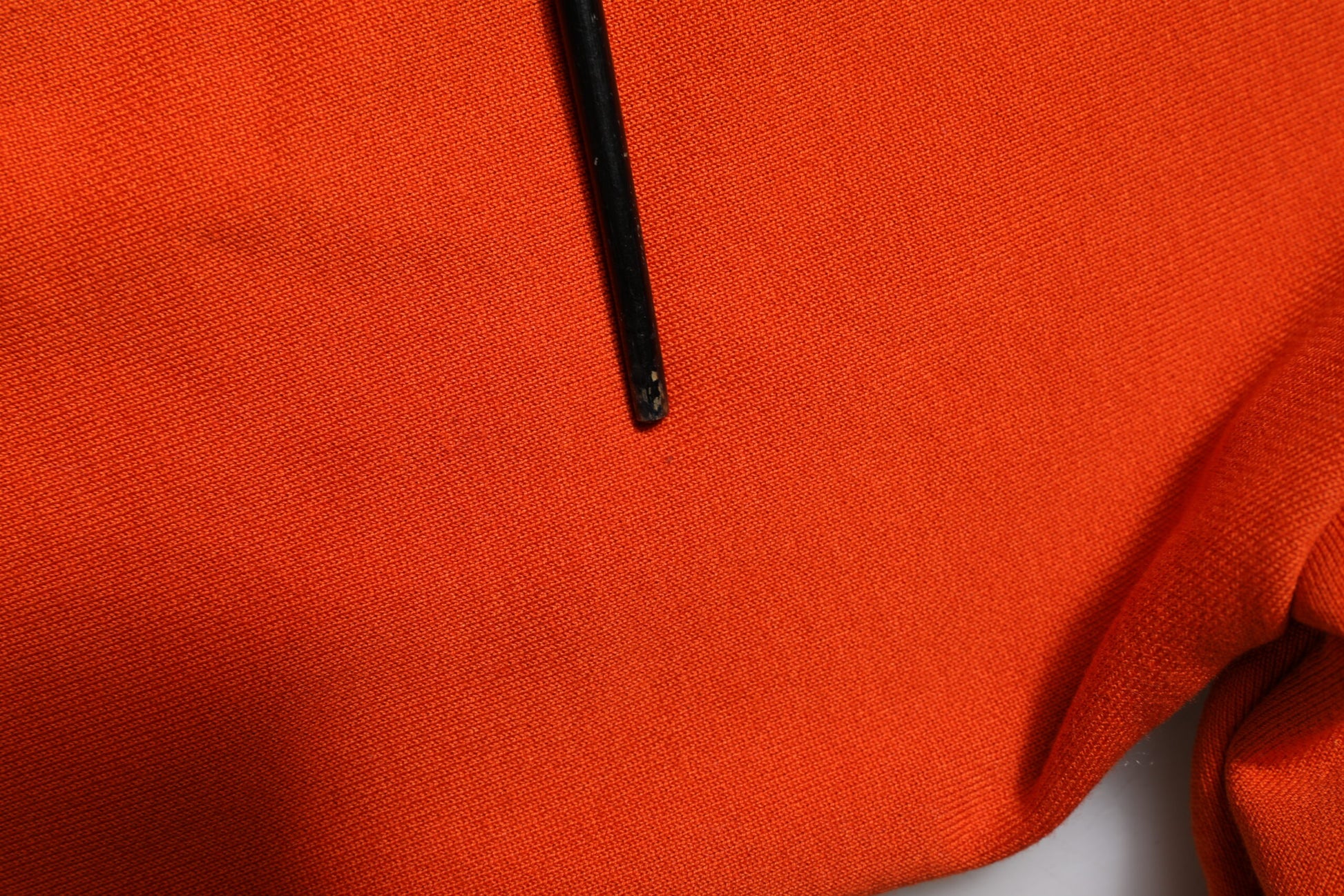 Red sweater with black zipper