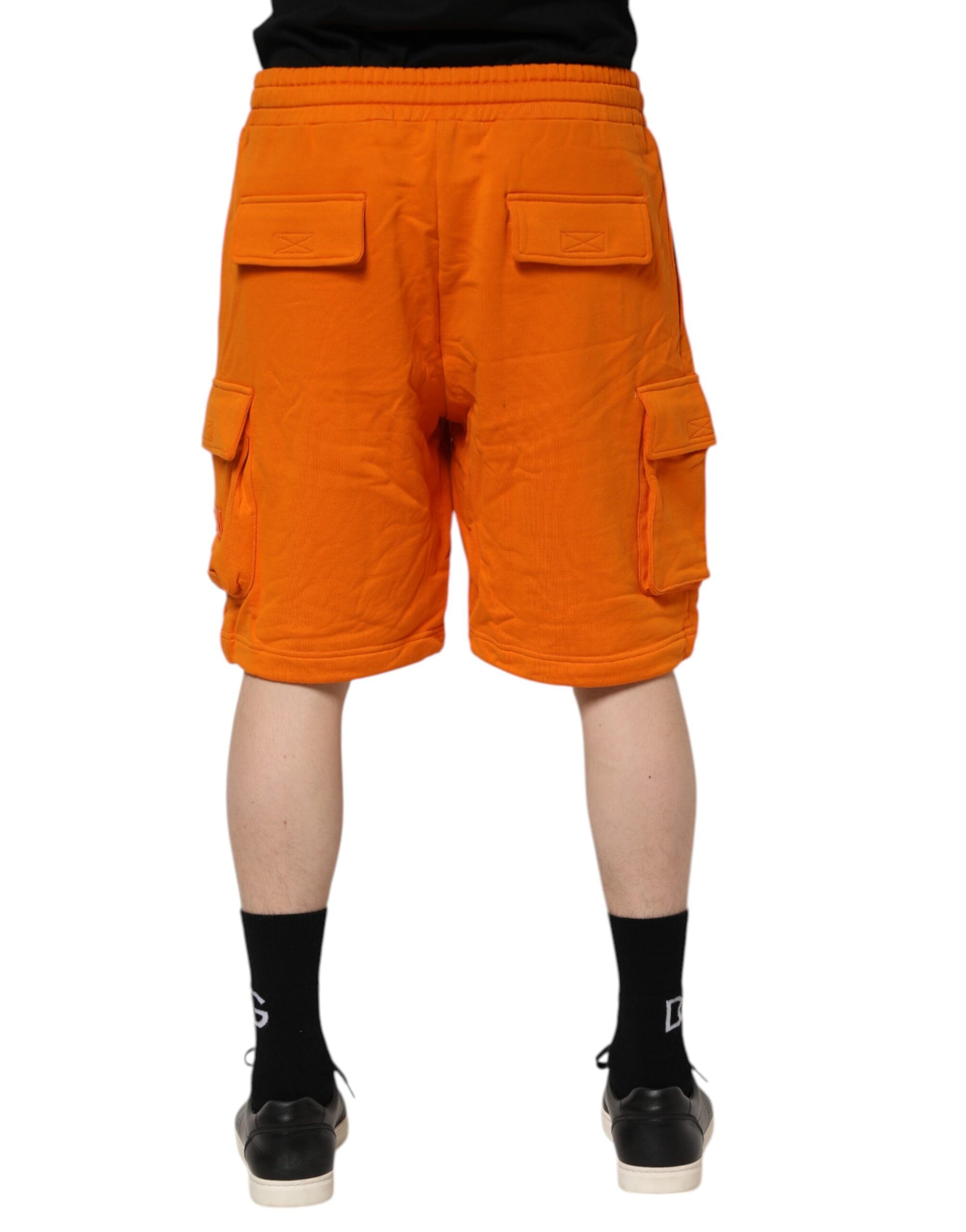 Orange cargo shorts with pockets on sides