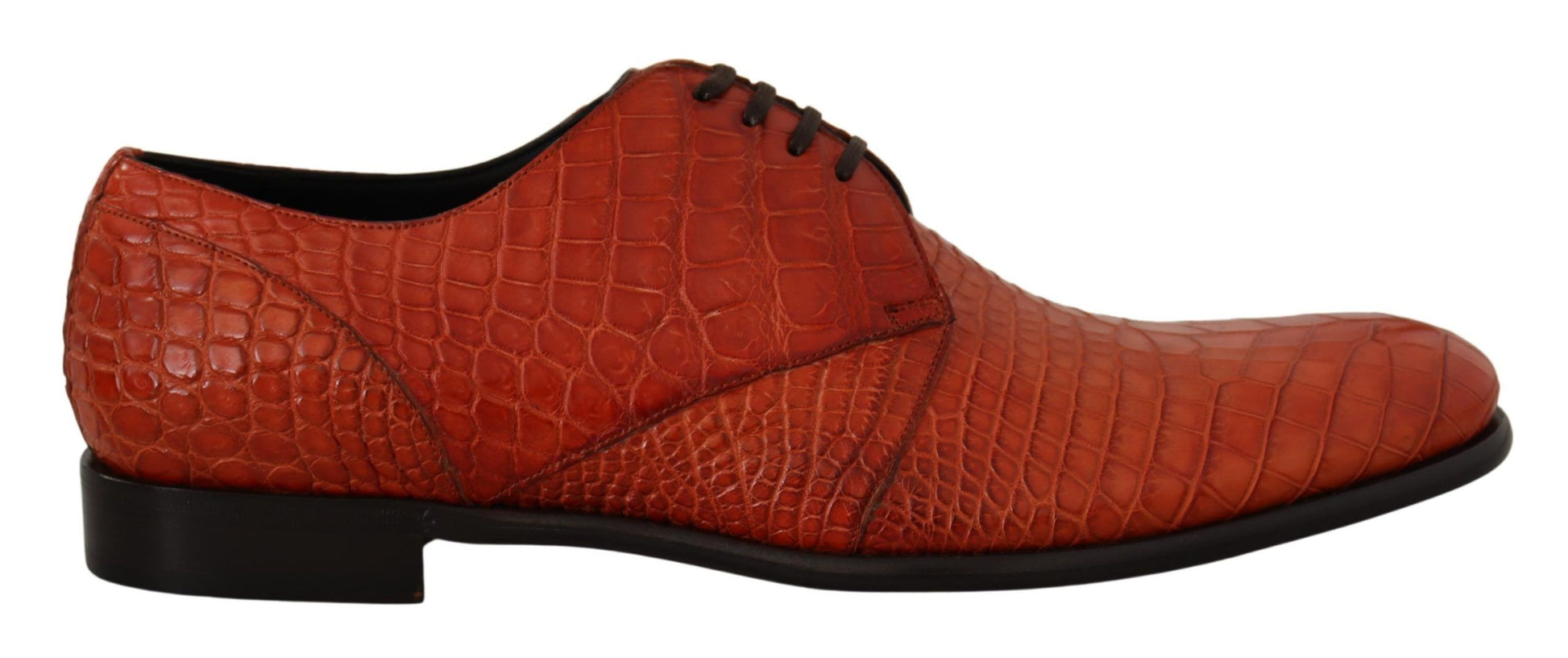 Red shoe with a crocodile skin texture design