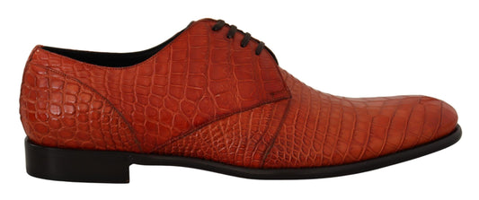 Red shoe with a crocodile skin texture design
