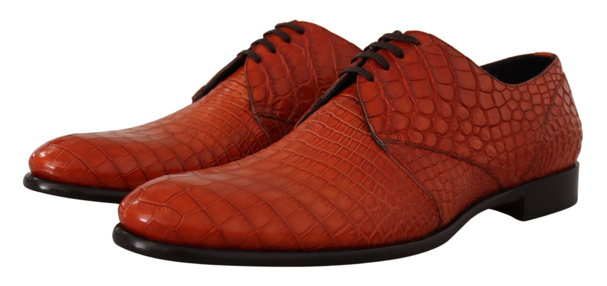 Red shoes with a crocodile skin texture and black laces