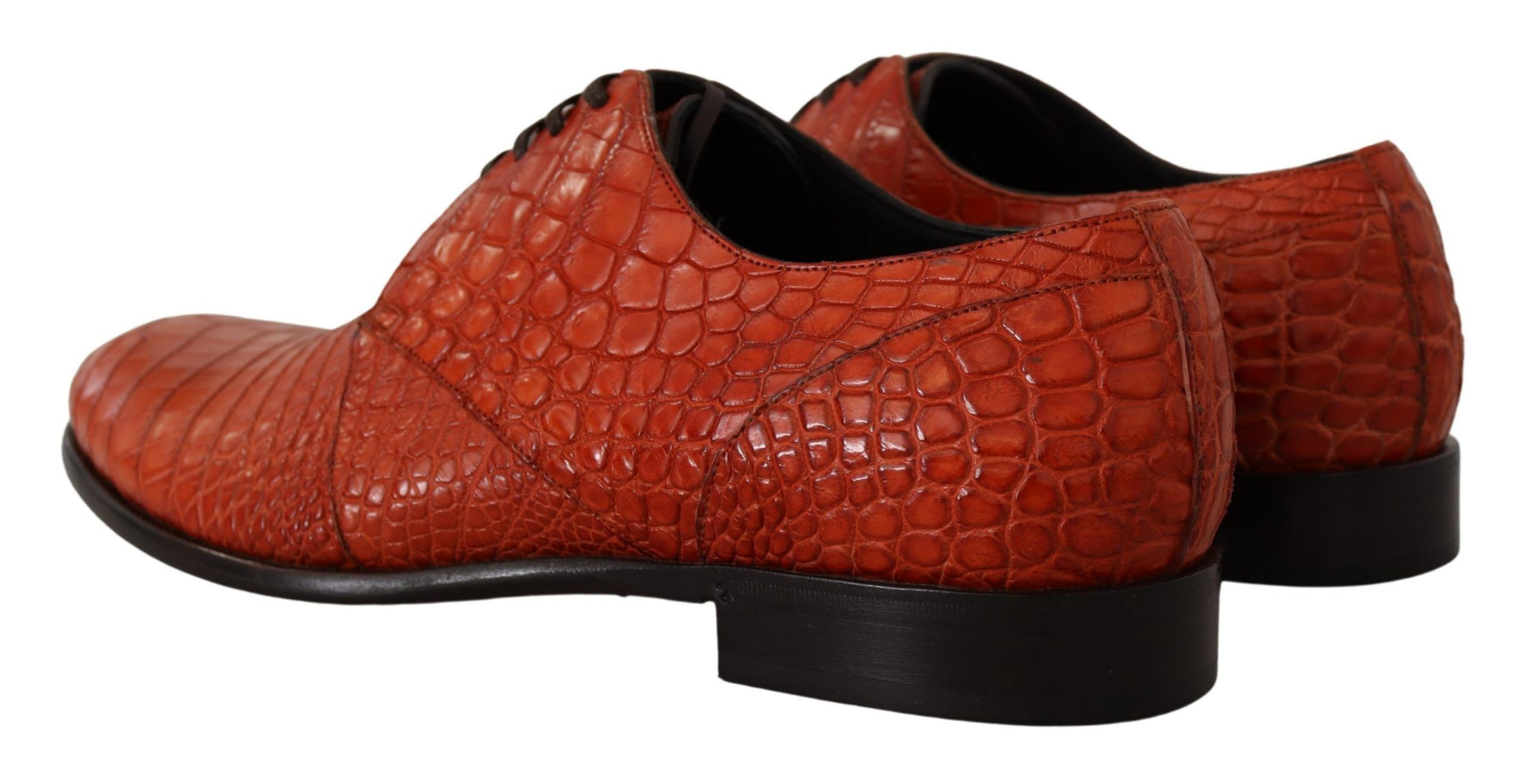 Red shoes with a crocodile skin texture design